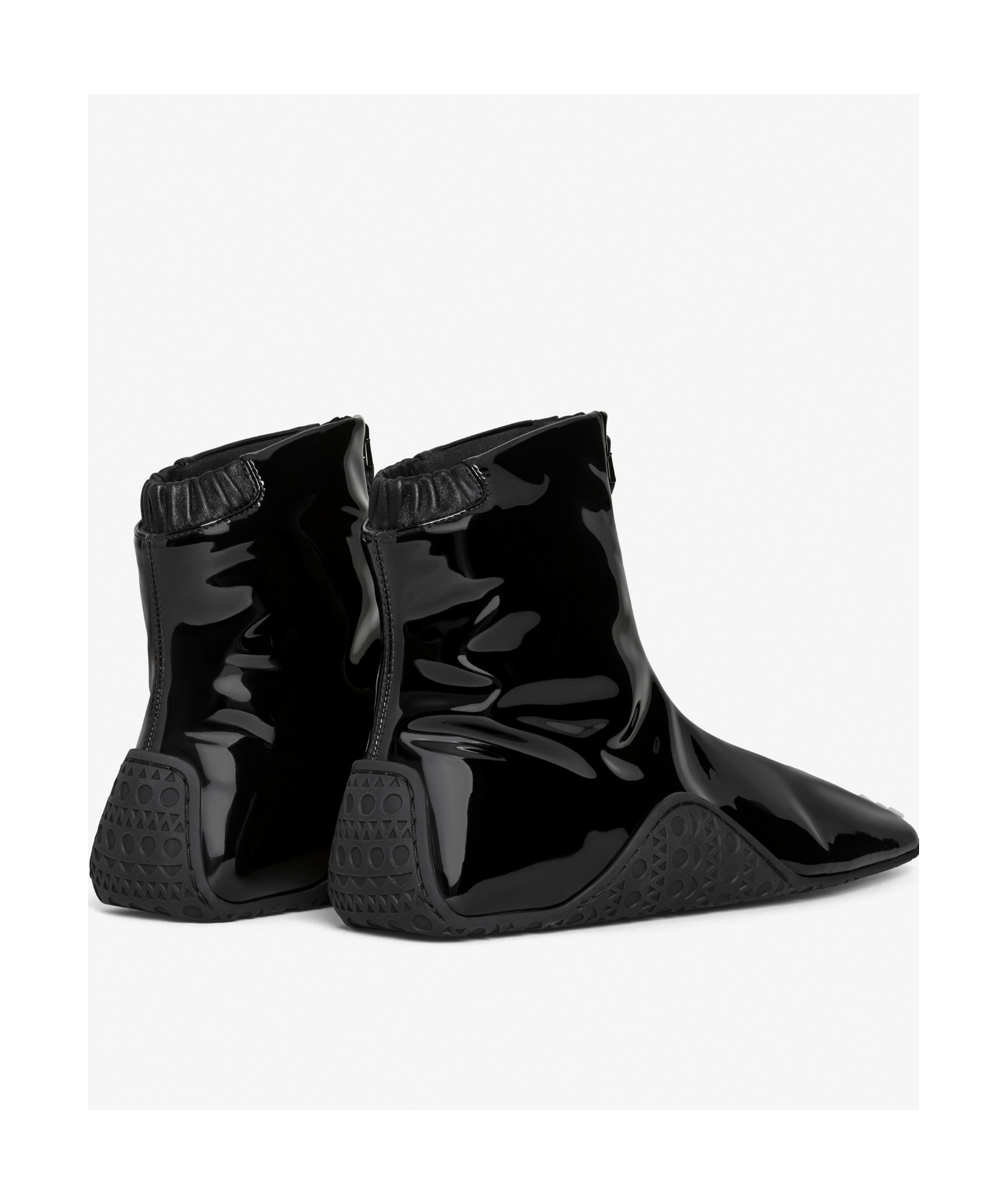 Shop Alaïa Logo-embossed Sneakers In Black