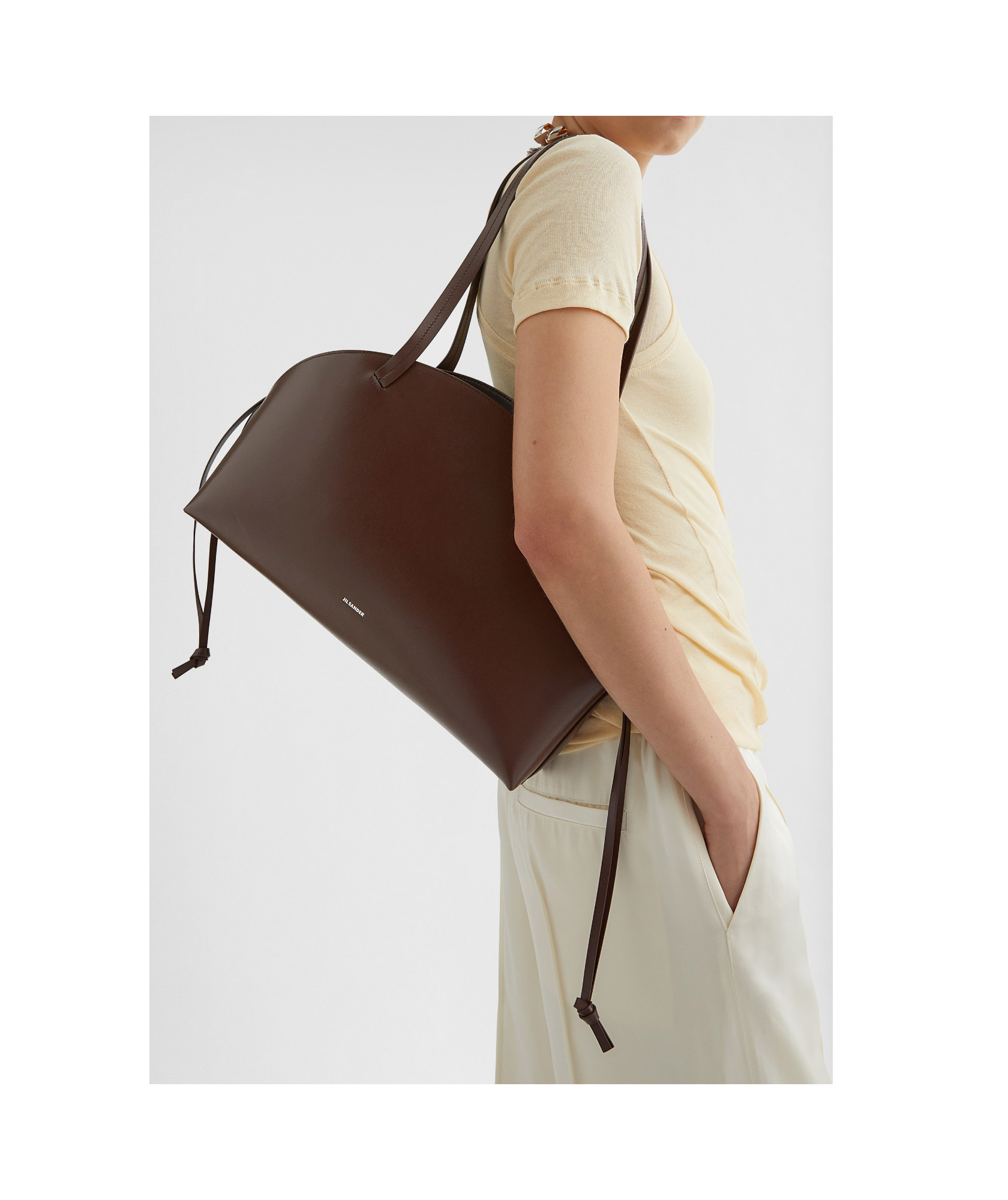 Jil Sander Curved Medium Shoulder Bag In Brown