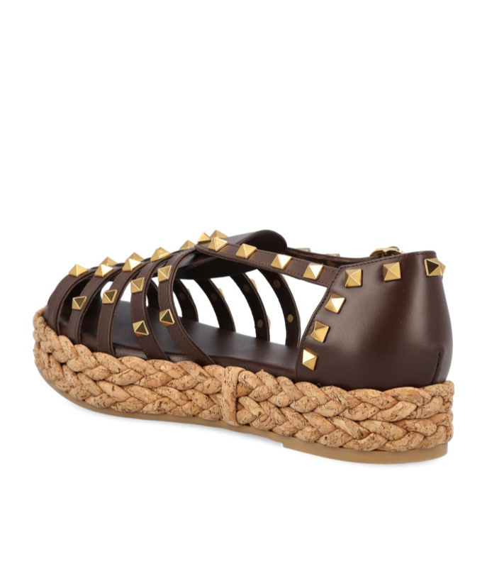 Valentino Garavani Rockstud Buckle Detailed Flat Shoes In Brown