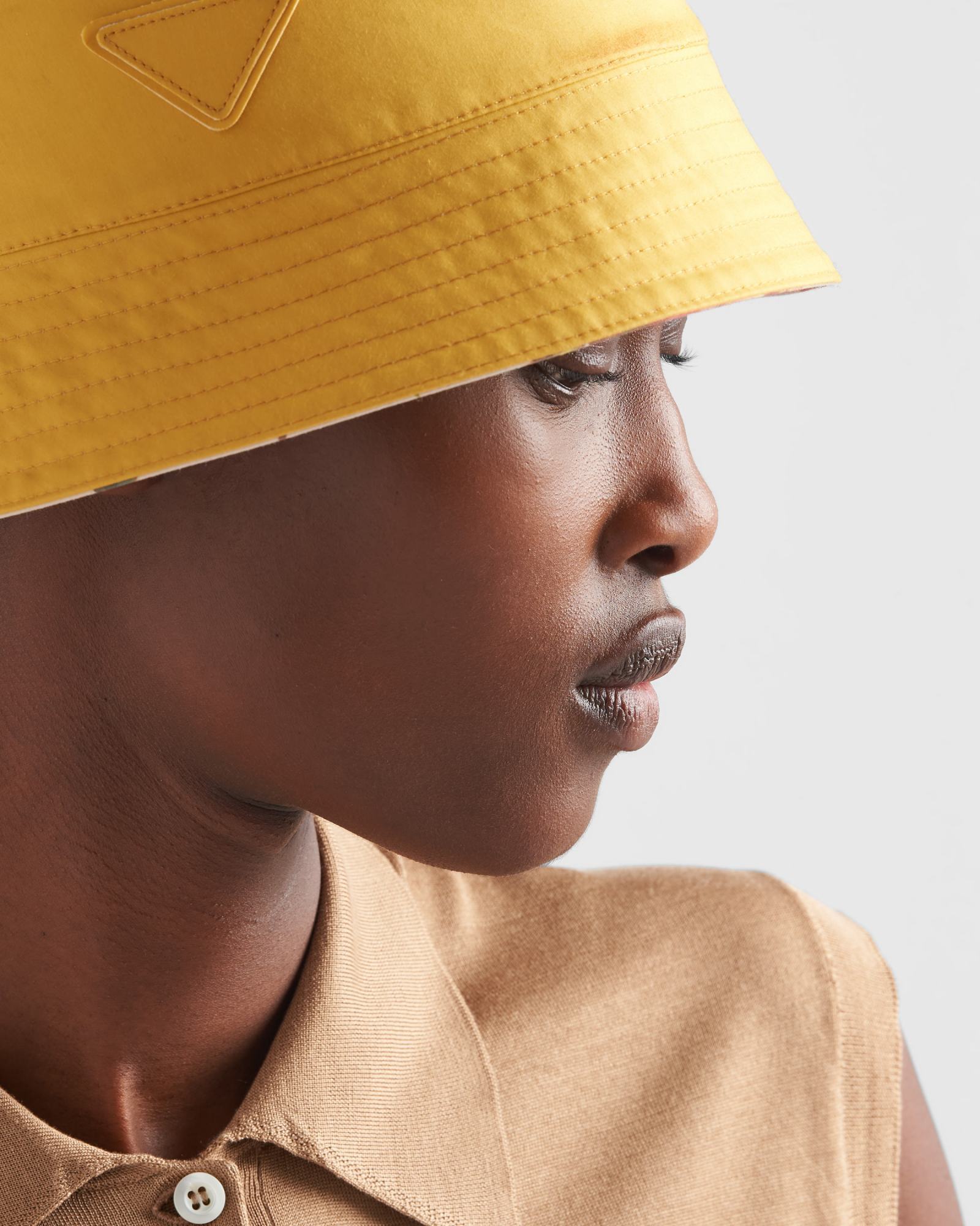 Prada Reversible Printed Cotton Bucket Hat In Nude