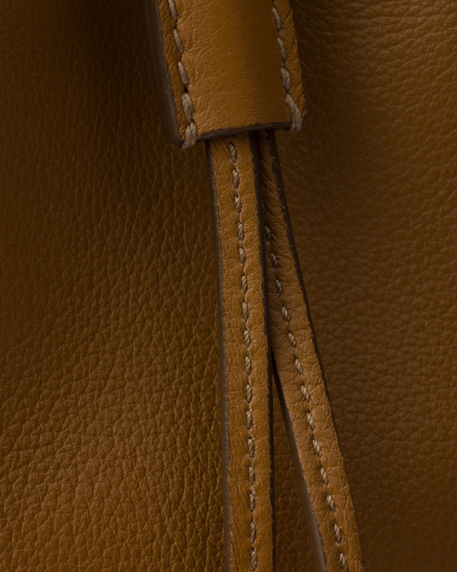 Prada Mini Drawstring Shoulder Bag In Brown