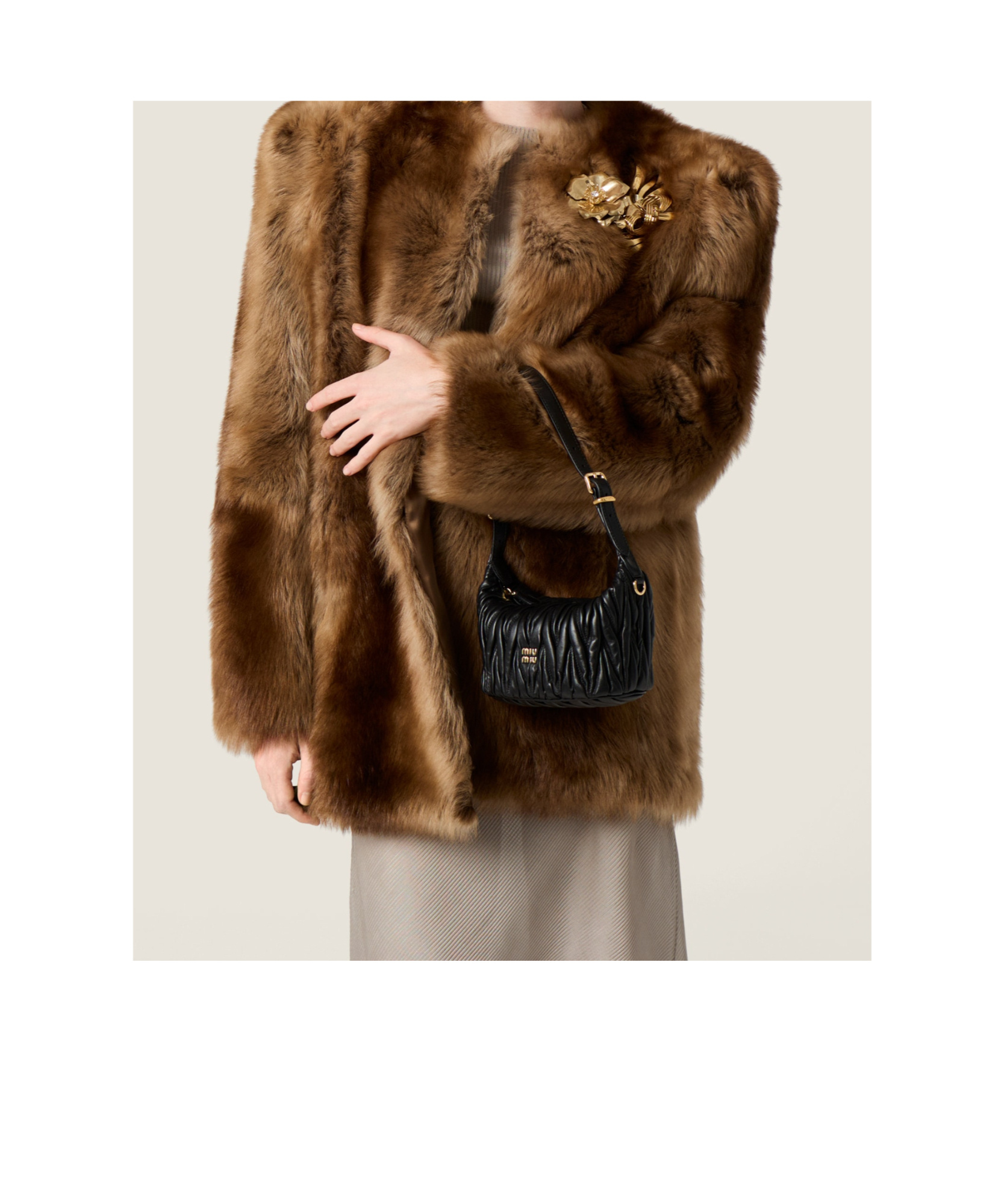Miu Miu Pochette En Cuir Nappa Matelassé In Black
