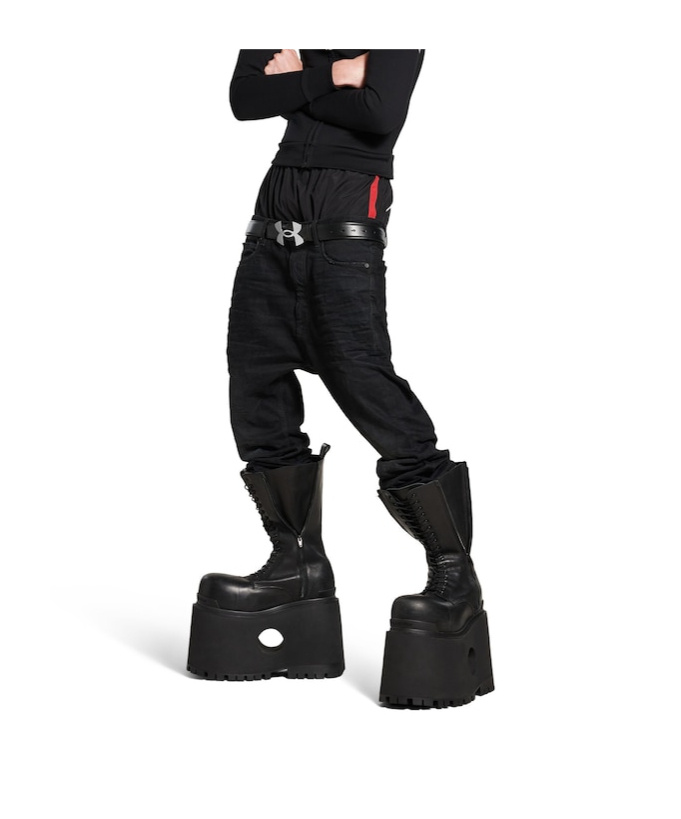 Balenciaga Layered Shell-trimmed Distressed Flared Jeans In Black