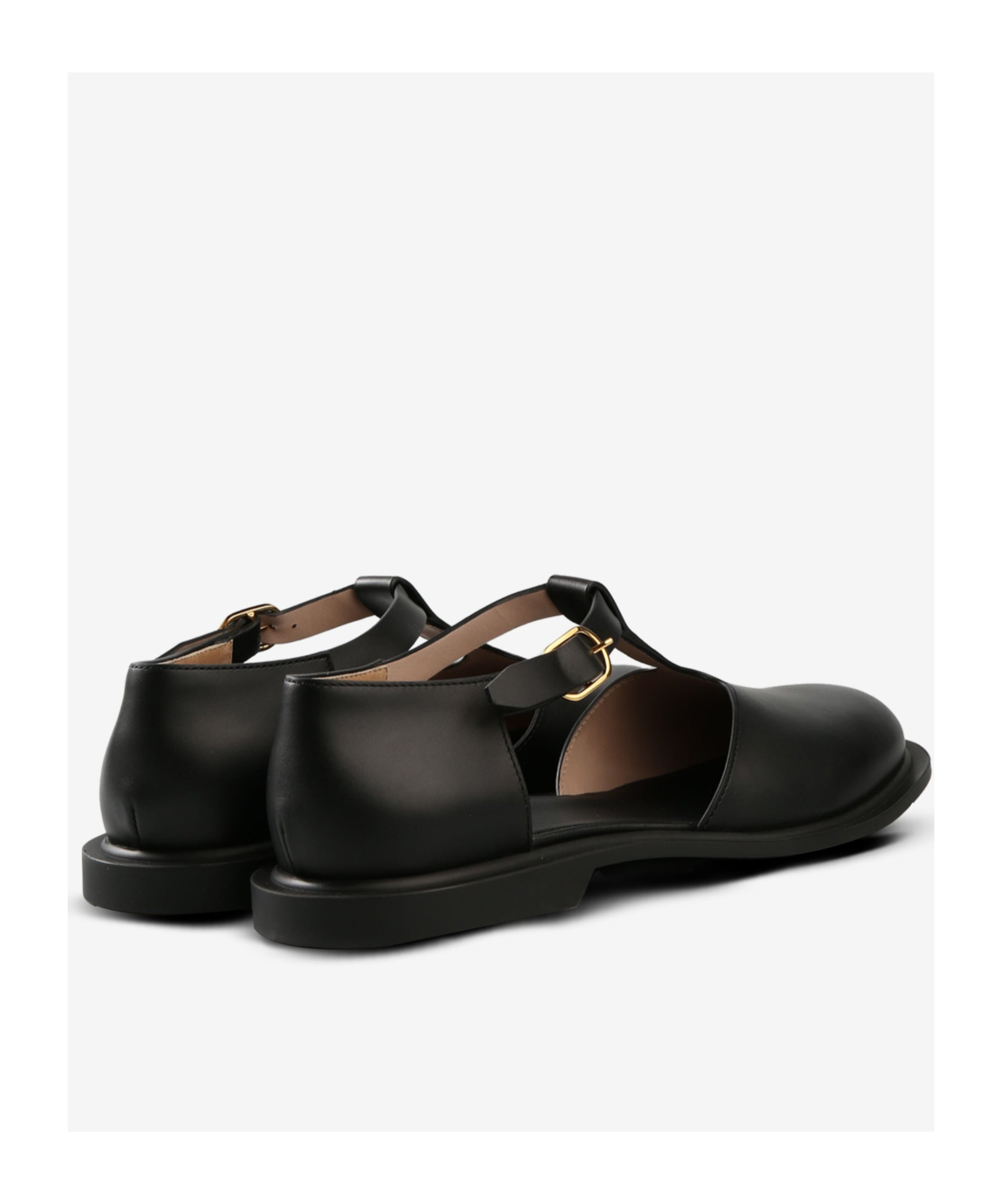 The Row Round Toe Flat Shoes In Black