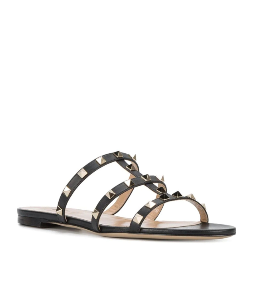 Shop Valentino Rockstud Flat Slide Sandal In Black