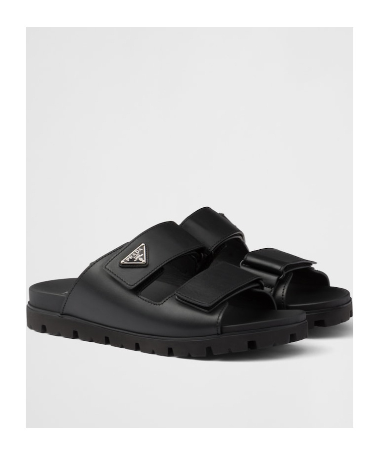 Prada Men Logo Plaque Leather Slides In Black