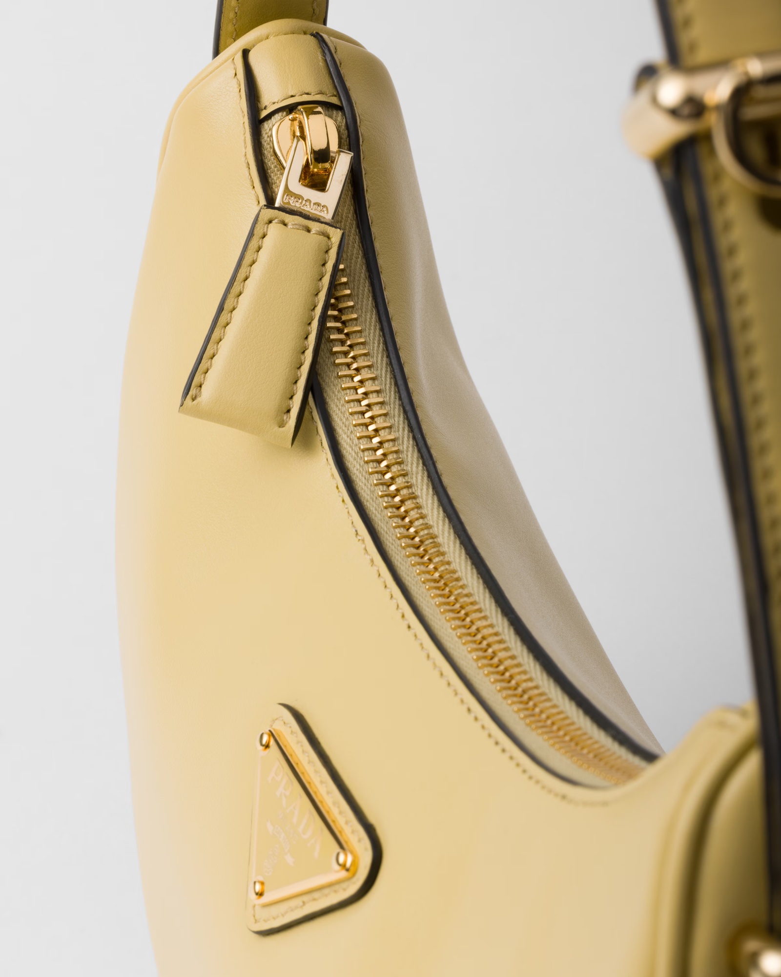 PRADA PRADA ARQUÉ LEATHER SHOULDER BAG
