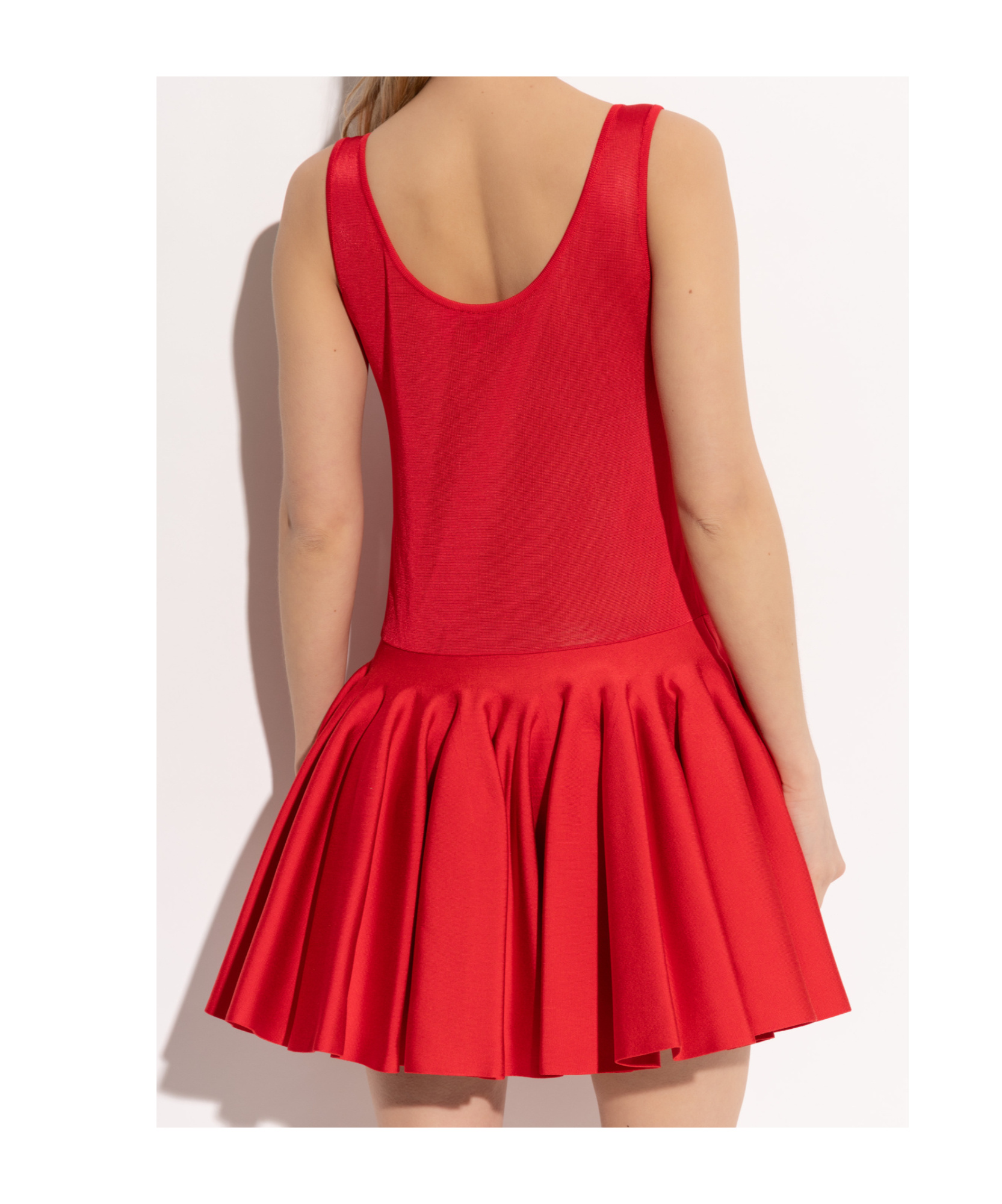 ALAÏA KNITTED GODET MINI DRESS 