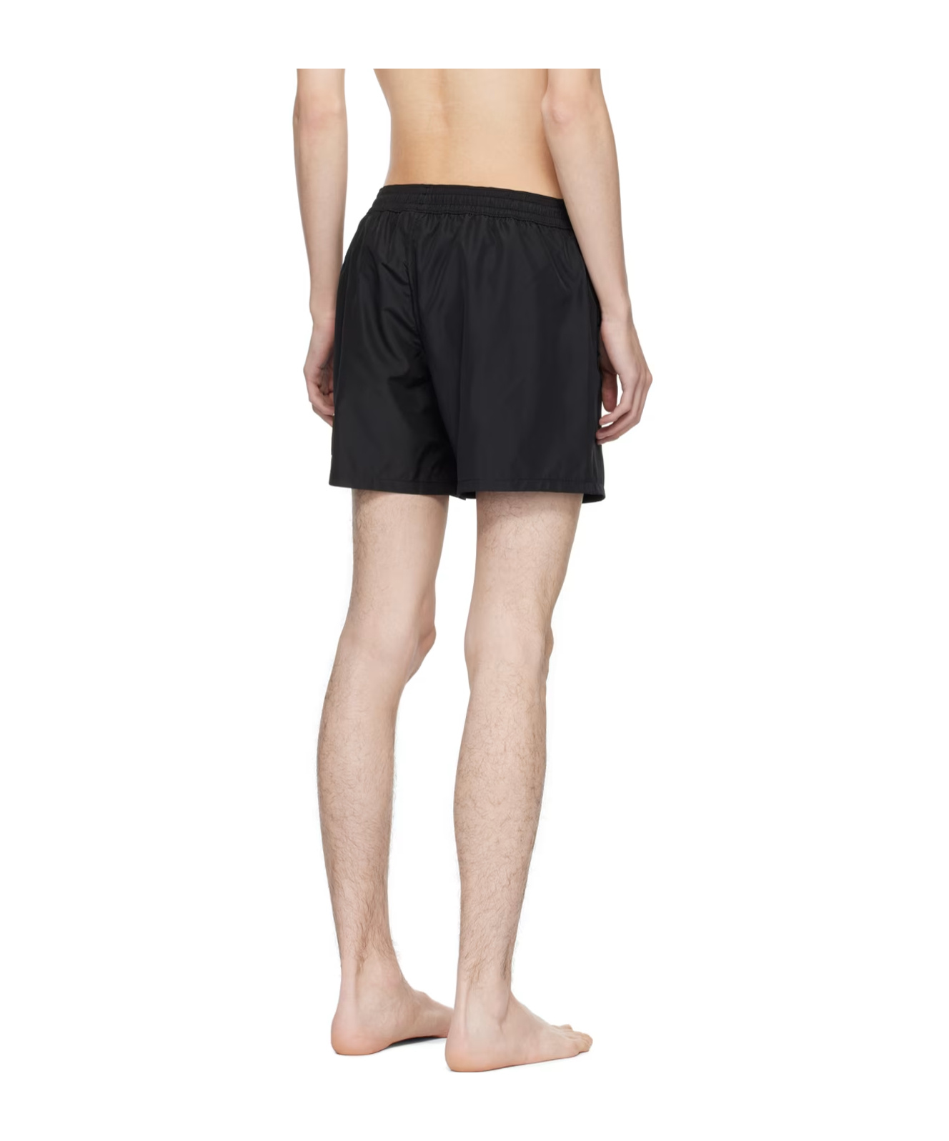 Shop Balmain Embossed-logo Swim Shorts In Black