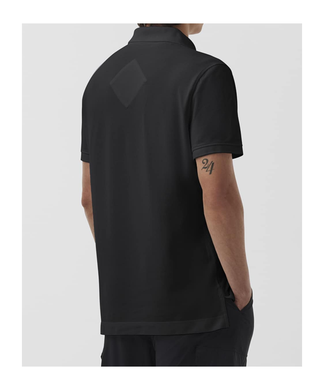 Shop Canada Goose Logo-appliqué Polo Shirt In Black