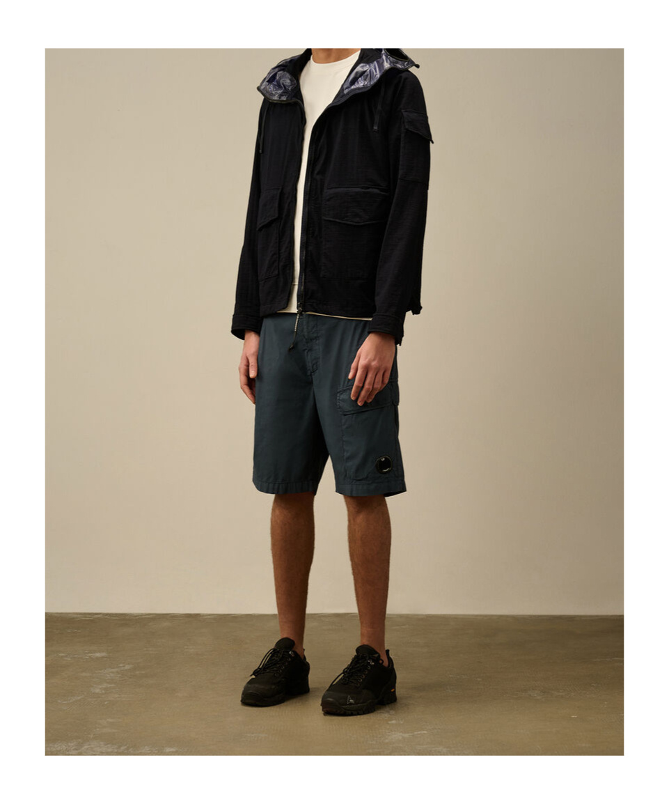 C.p. Company Blue Jacket With Explorer Hood And Adjustable Drawstring Waist In Tech Fabric Man In Black