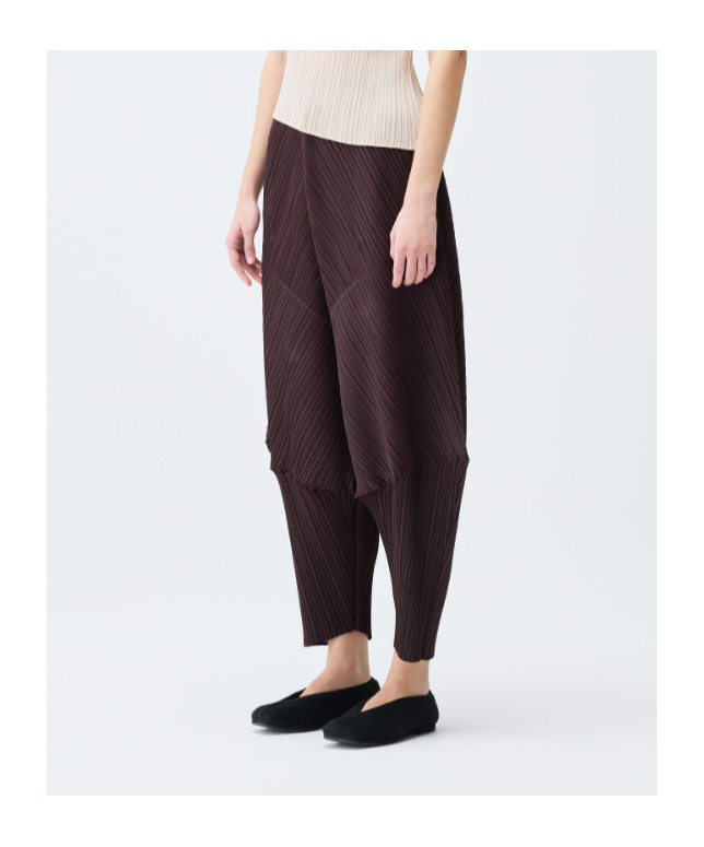 Issey Miyake Womens Dark Brown Leap Tapered-leg Knitted Trousers In Brown
