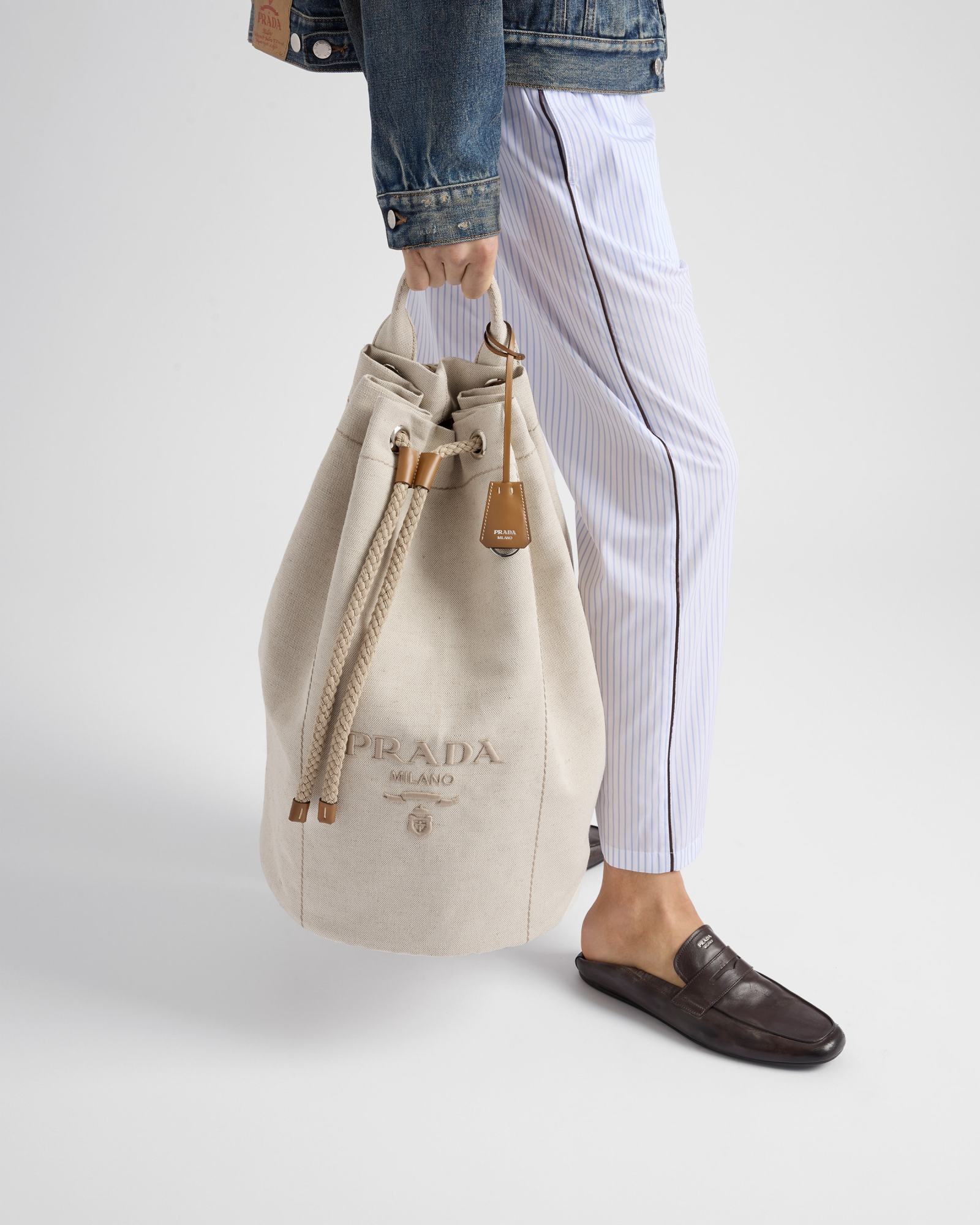Prada Canvas Backpack With Eyelet Detailing And Top Handle