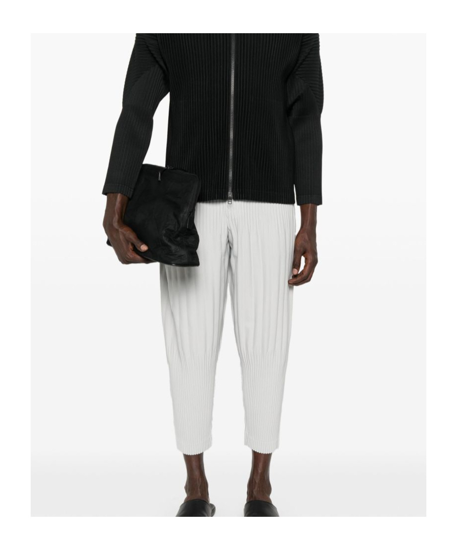 Issey Miyake Basic Pleated Tapered-leg Knitted Trousers In Gray