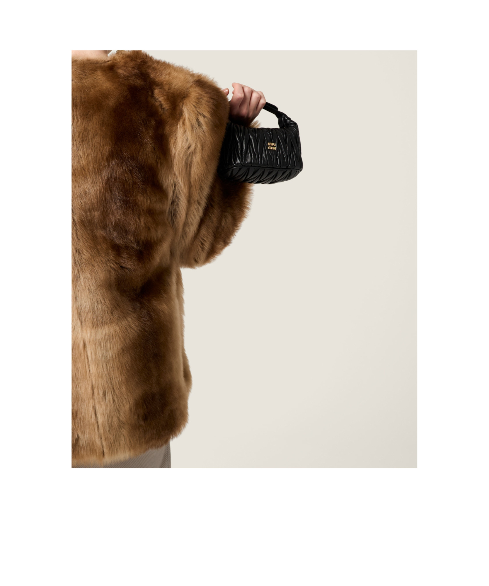 Miu Miu Pochette En Cuir Nappa Matelassé In Black