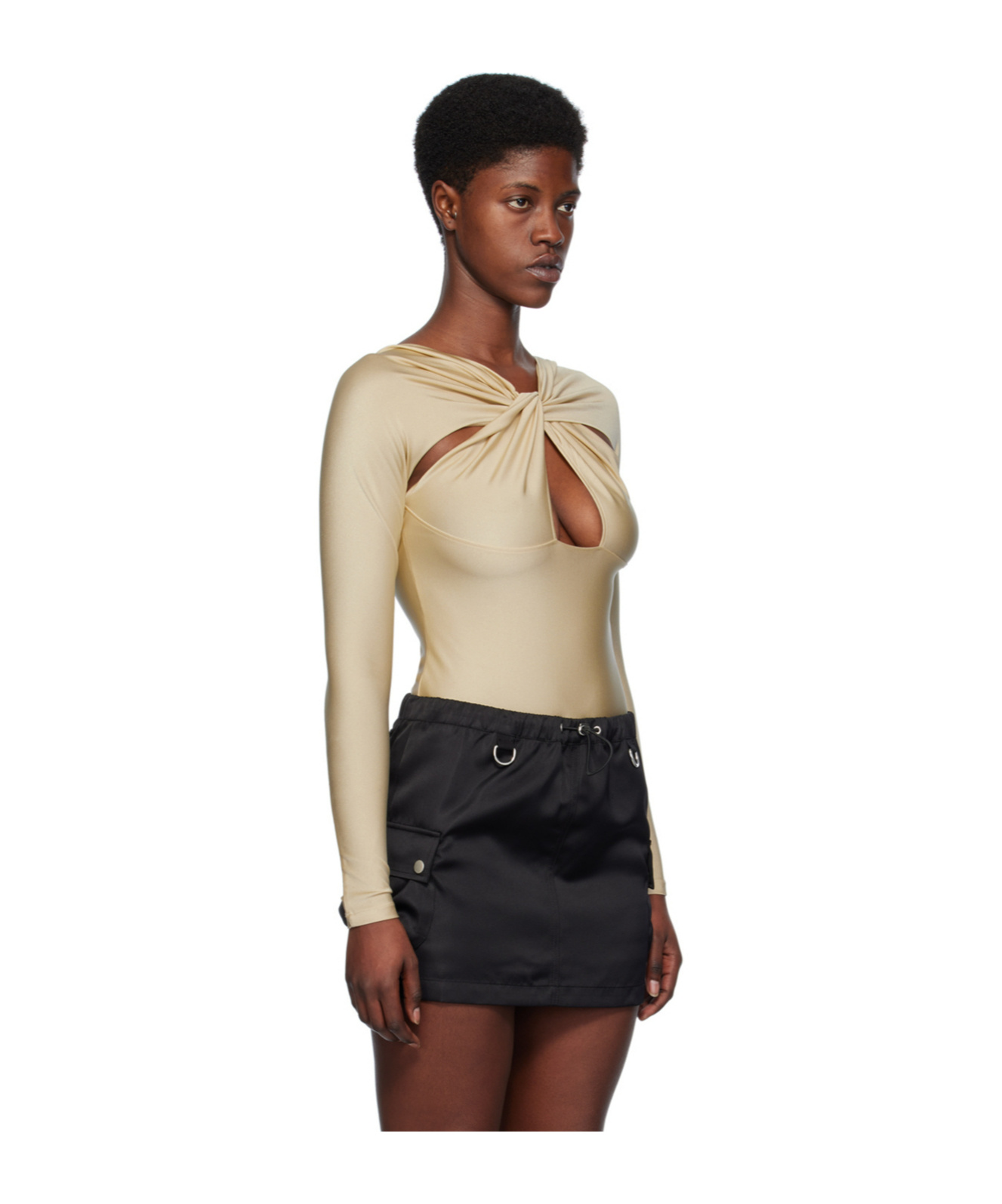Coperni Hollowed Out Long-sleeved Jumpsuit In Nude