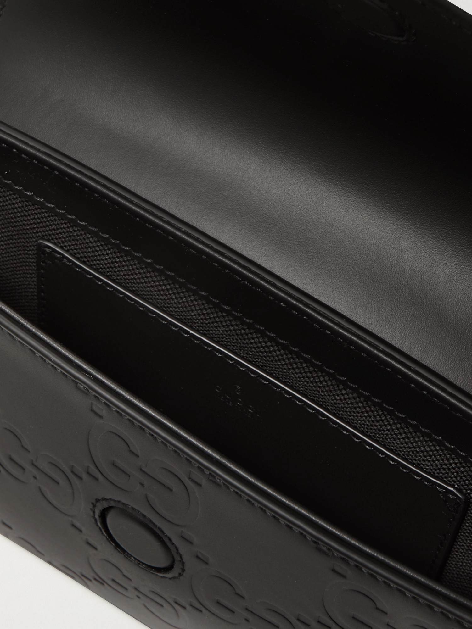 Gucci Gg Mini Leather Crossbody Bag In Black