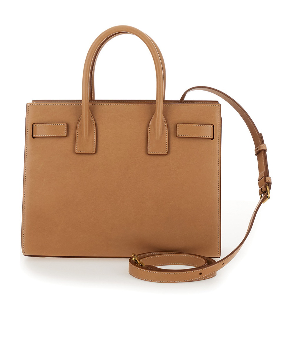 Saint Laurent Camel Leather Baby Sac De Jour Handbag In Brown