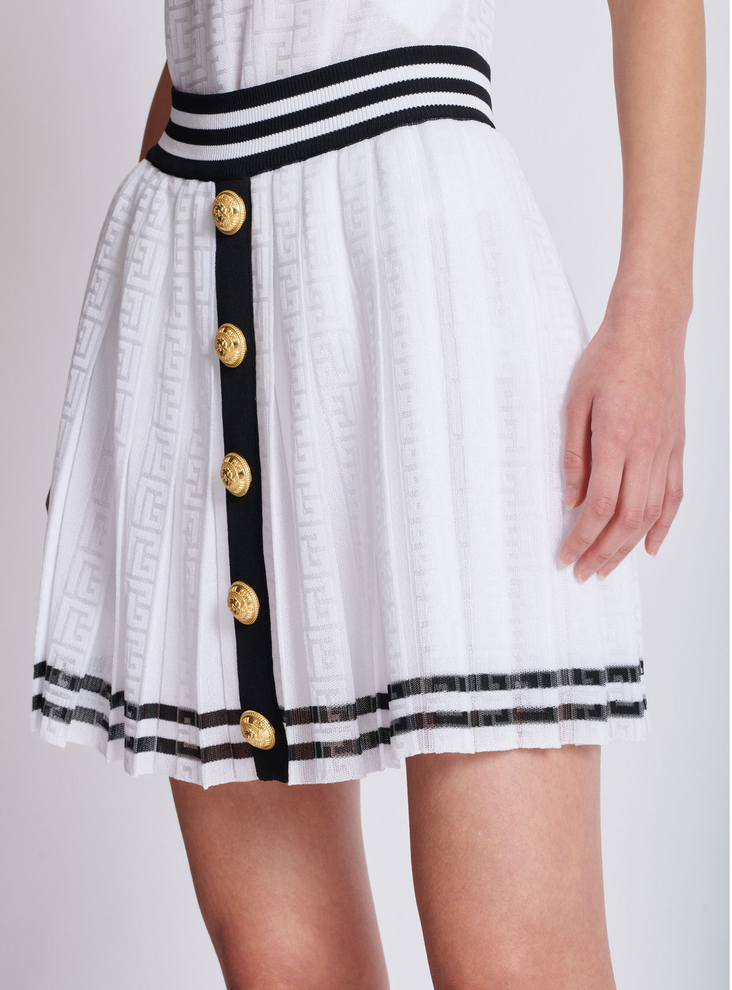 Balmain Pleated Monogrammed Knit Skirt In White