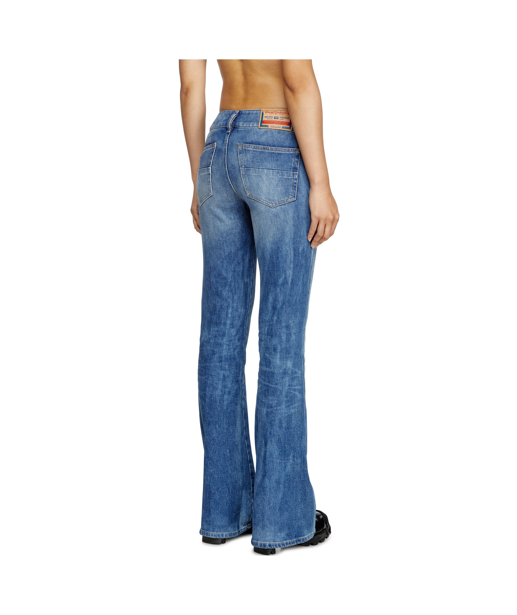 Diesel D-hush Partially Organic Cotton Flared Jeans With Back Logo Patch In Blue