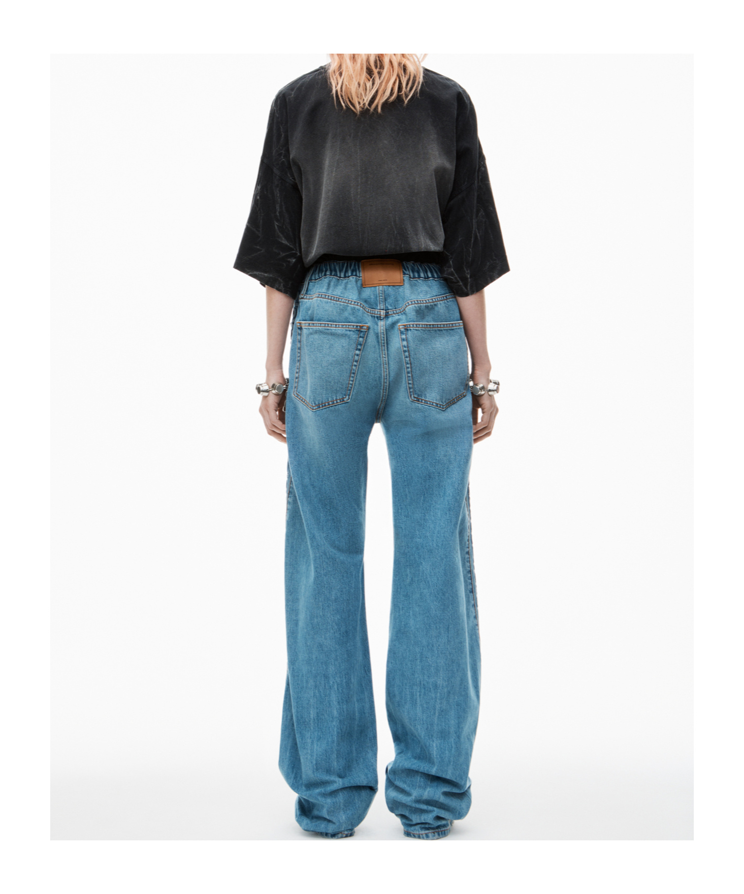 ALEXANDER WANG LOGO-EMBOSSED BOYFRIEND JEANS