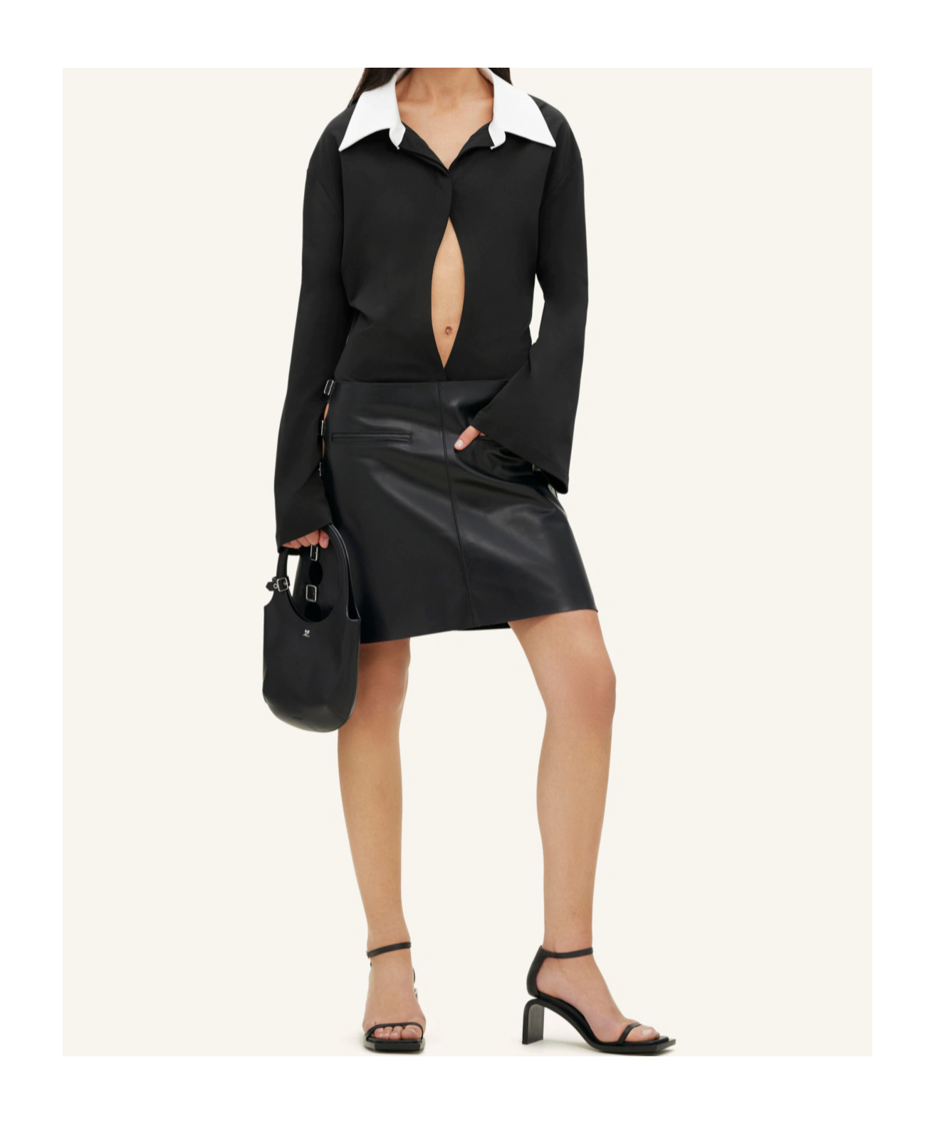 Courrèges Spread-collar Buttoned Jumpsuit In Black