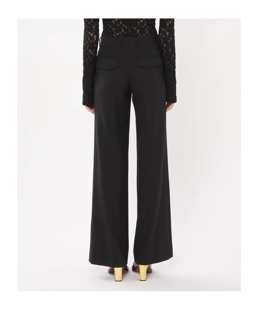 Chloé Flared Wool Trousers Asymmetrical Hems In Black
