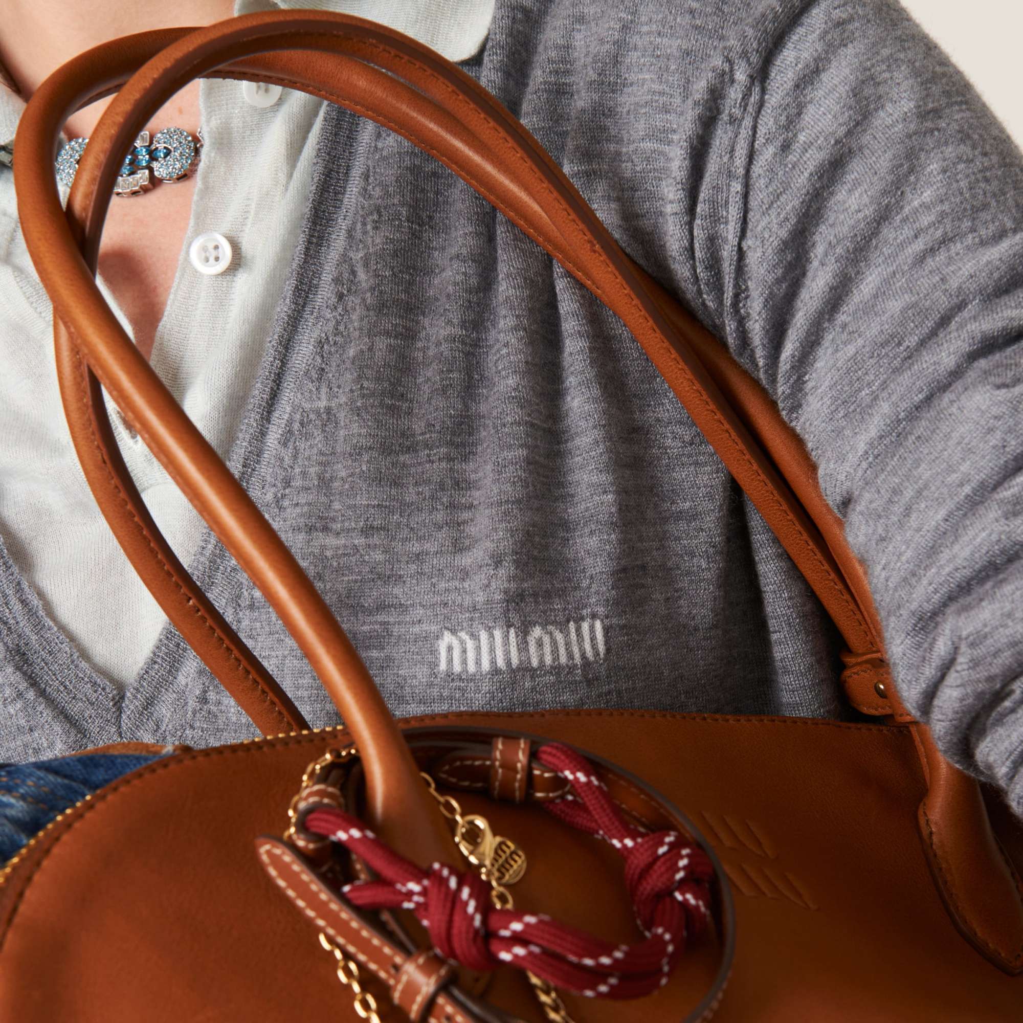 Miu Miu Logo-embroidered V-neck Jumper In Gray