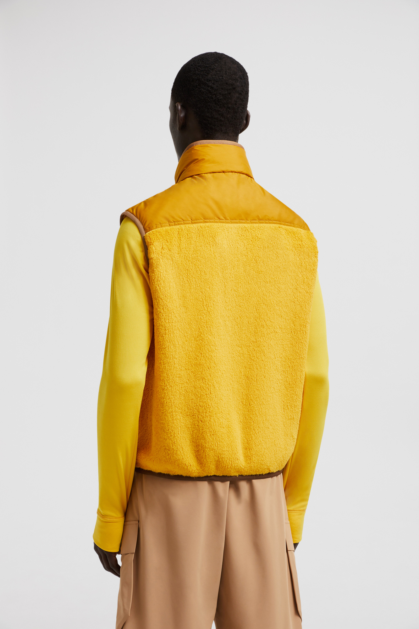 Moncler Logo Embroidered Down Vest In Yellow