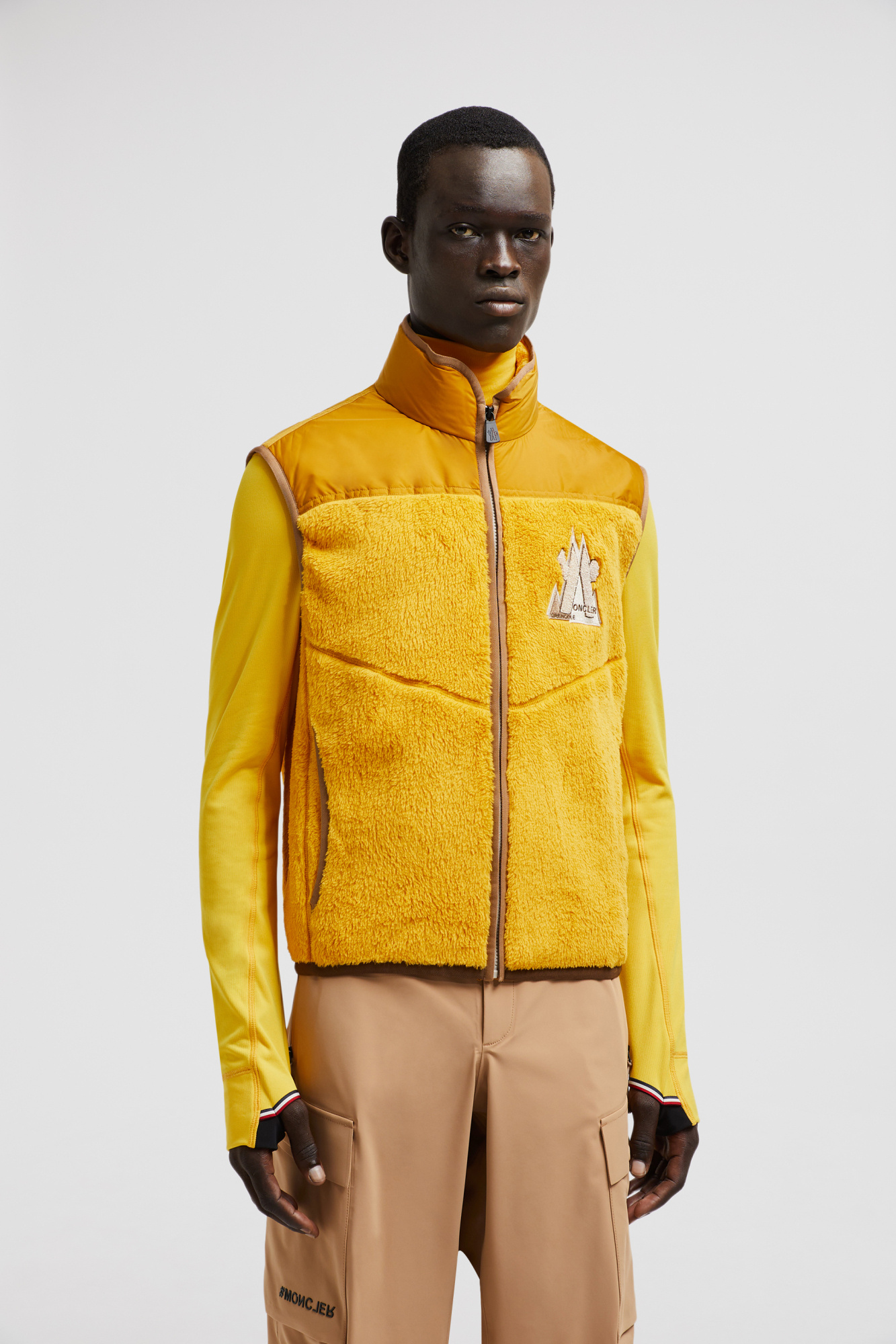 Moncler Logo Embroidered Down Vest In Yellow