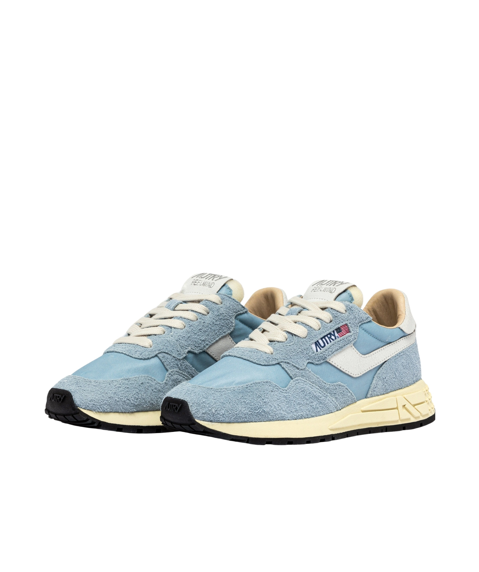 Shop Autry Reelwind Low 'lilac' Sneakers In Blue