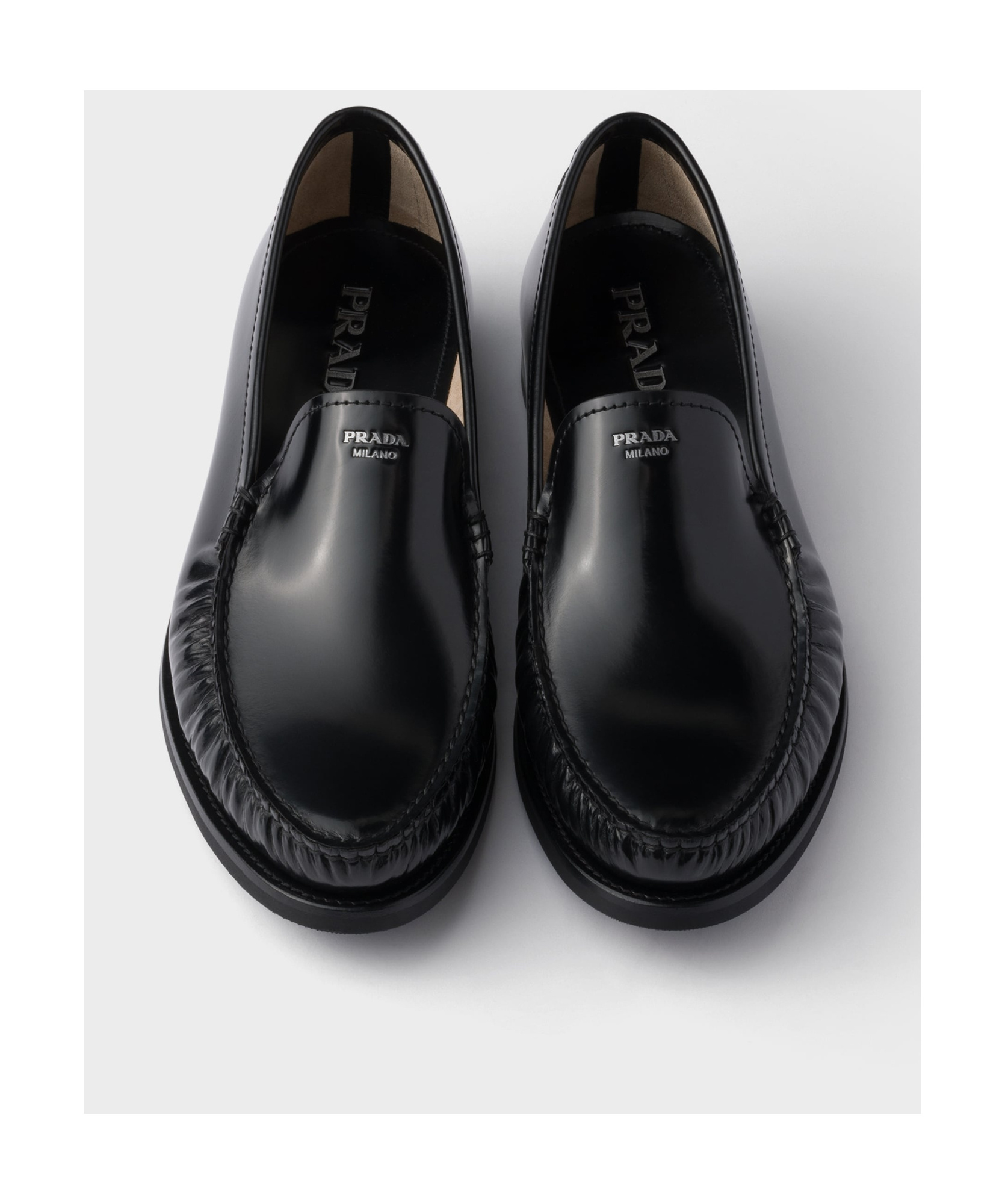 Prada Polished Leather Flat Shoes In Black