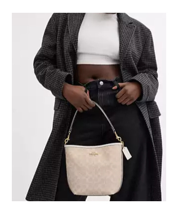 Coach City's Iconic Canvas Shoulder Bag In Nude