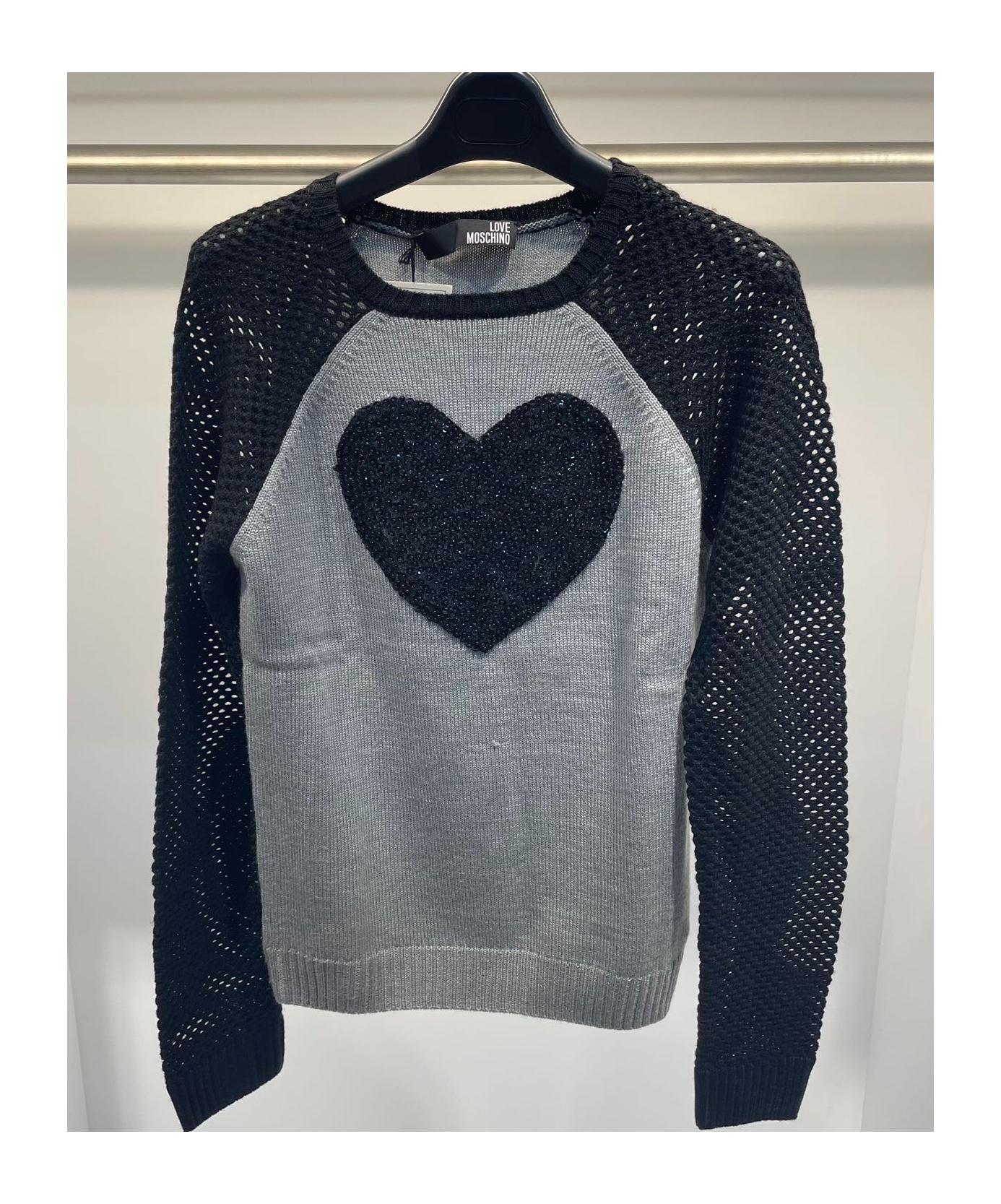 Moschino Color-matching Knitted Sweater In Black