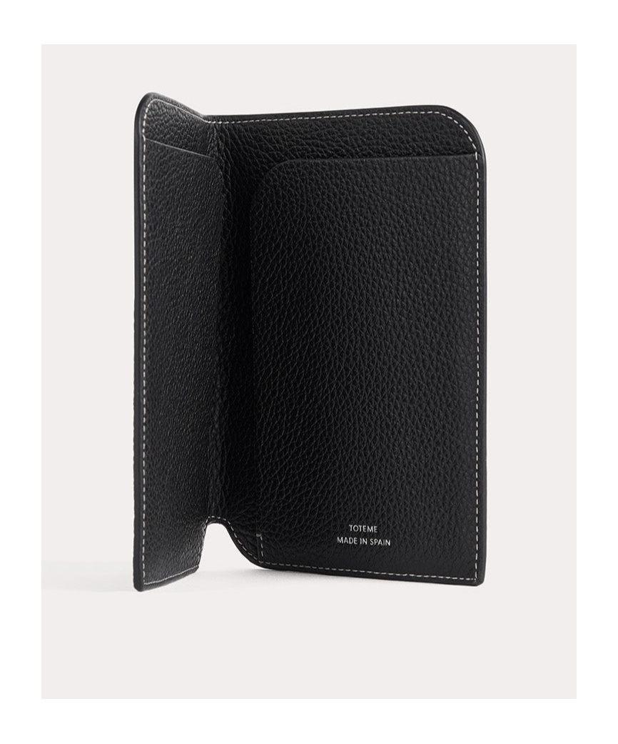 Totême Monogram Embossed Wallet In Black