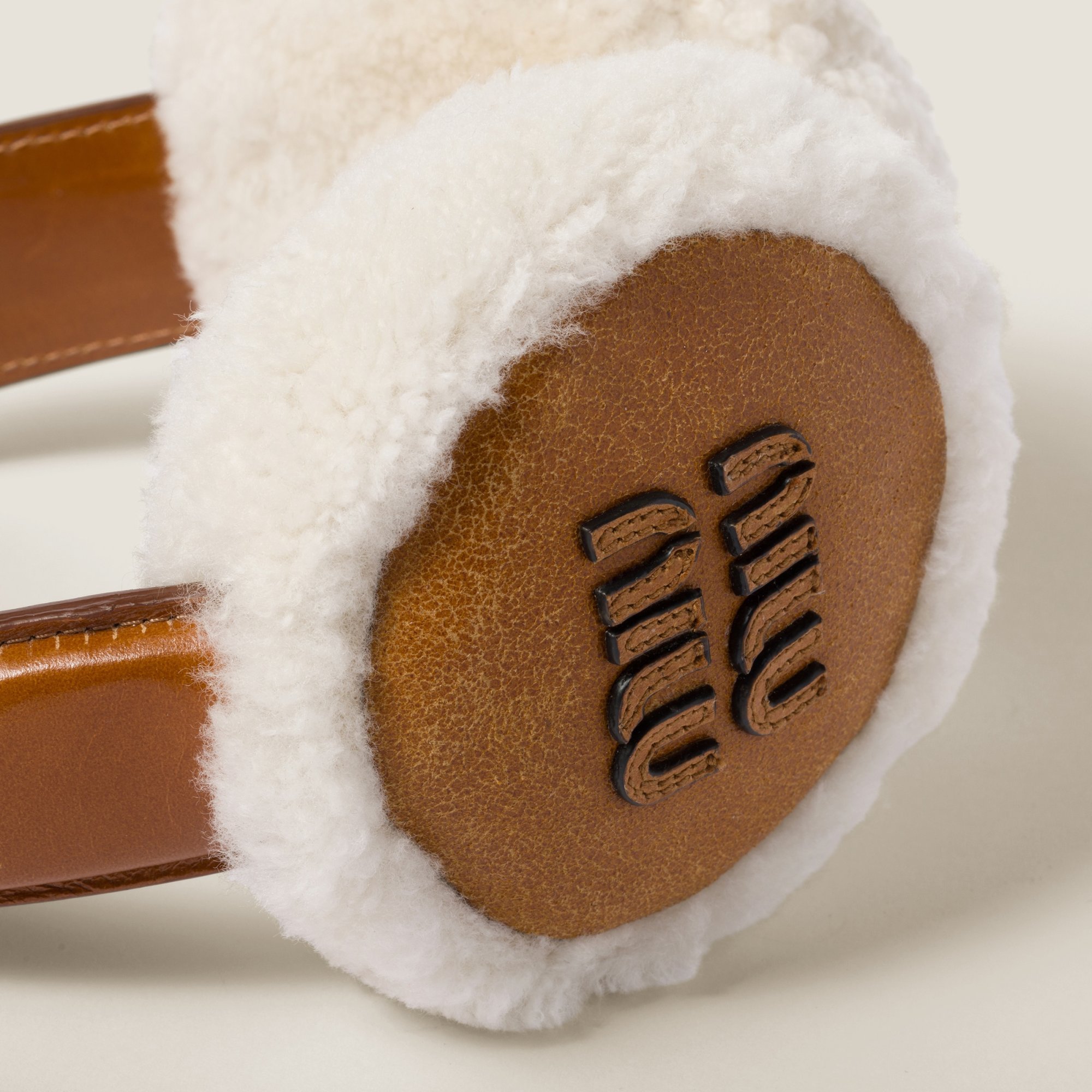 Miu Miu Shearling Earmuffs In White