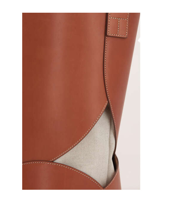 Jil Sander Logo Embossed Drawstring Bucket Bag In Brown