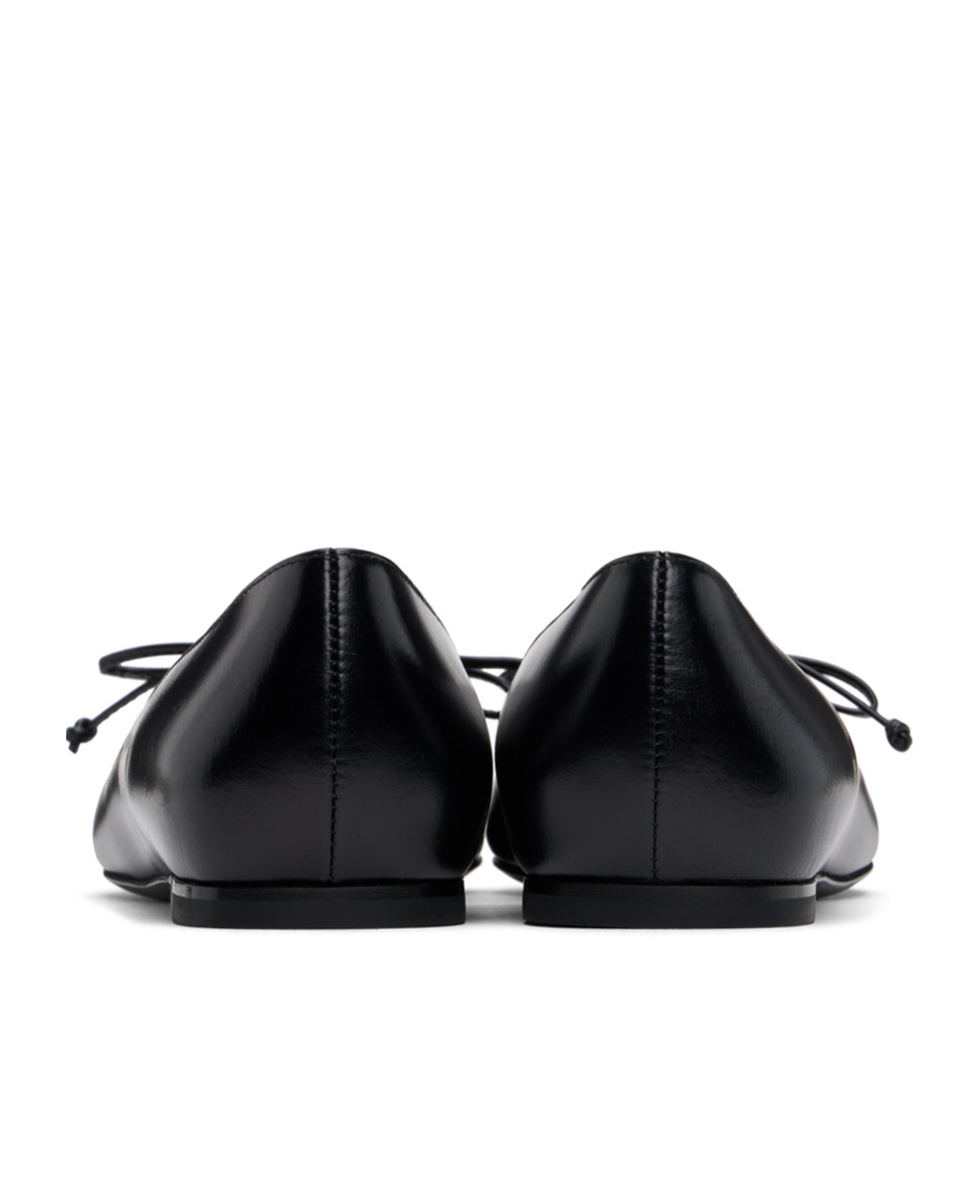 Alaïa Pointed Knot Flat Soles In Black