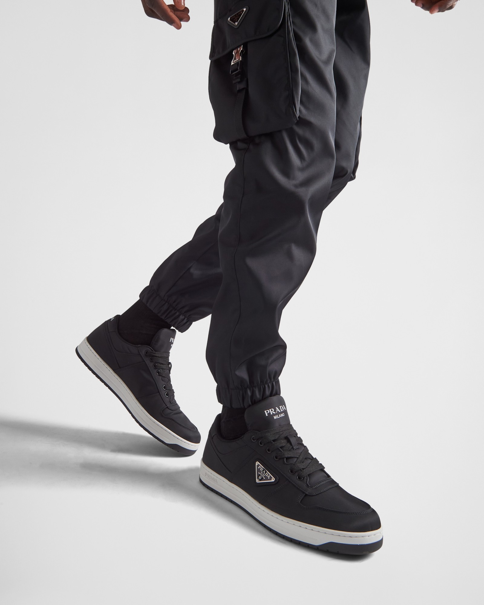 Prada Leather Sneakers With Perforated Toe Cap In Black