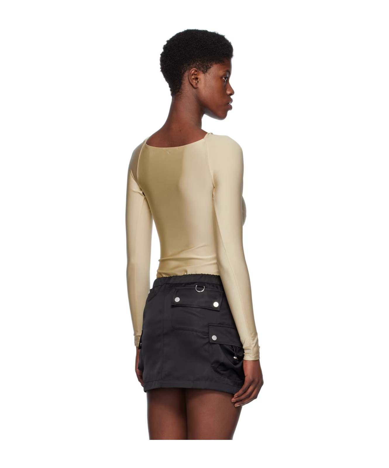 Coperni Hollowed Out Long-sleeved Jumpsuit In Nude