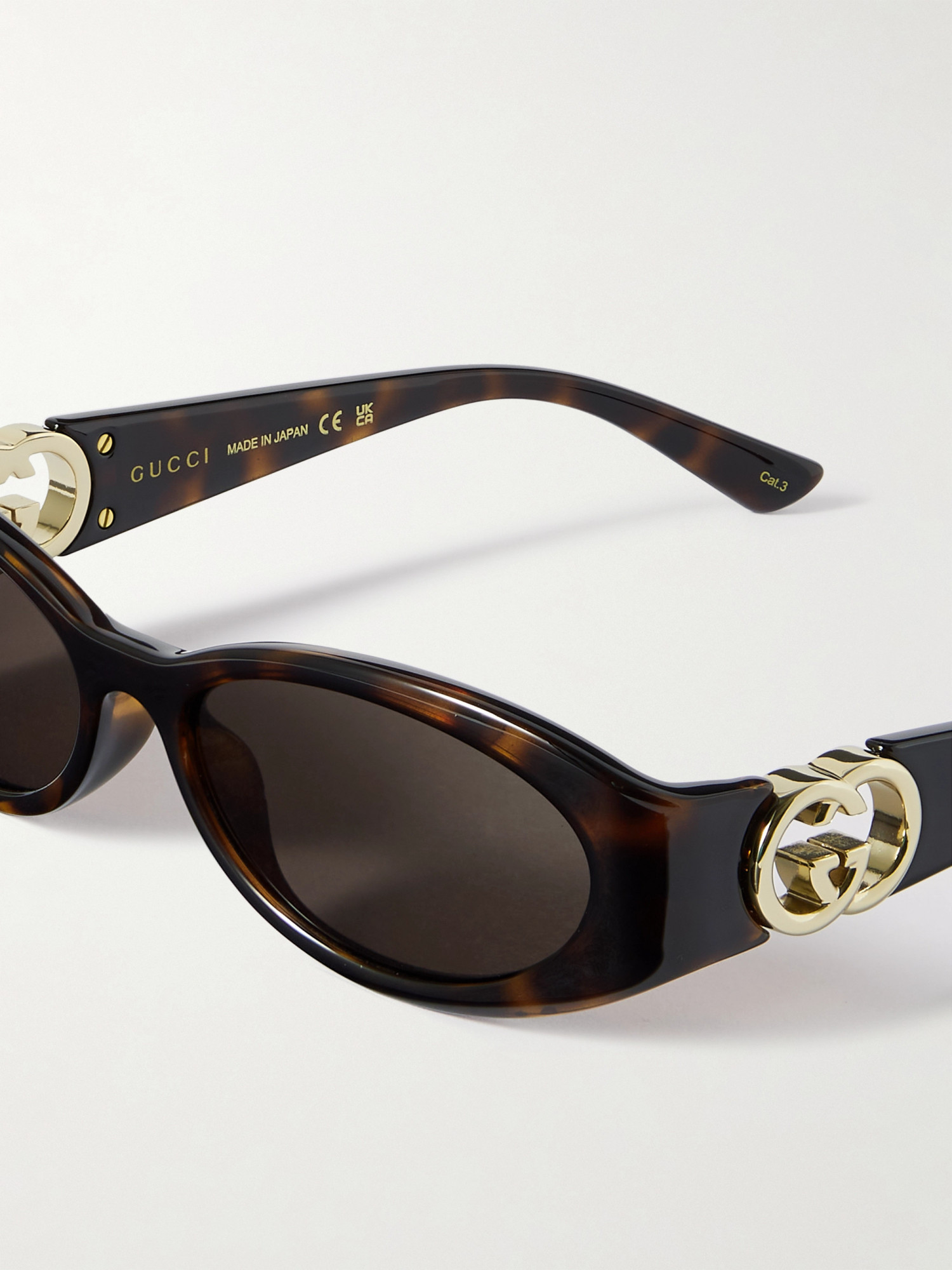 Gucci Oval-frame Sunglasses In Black