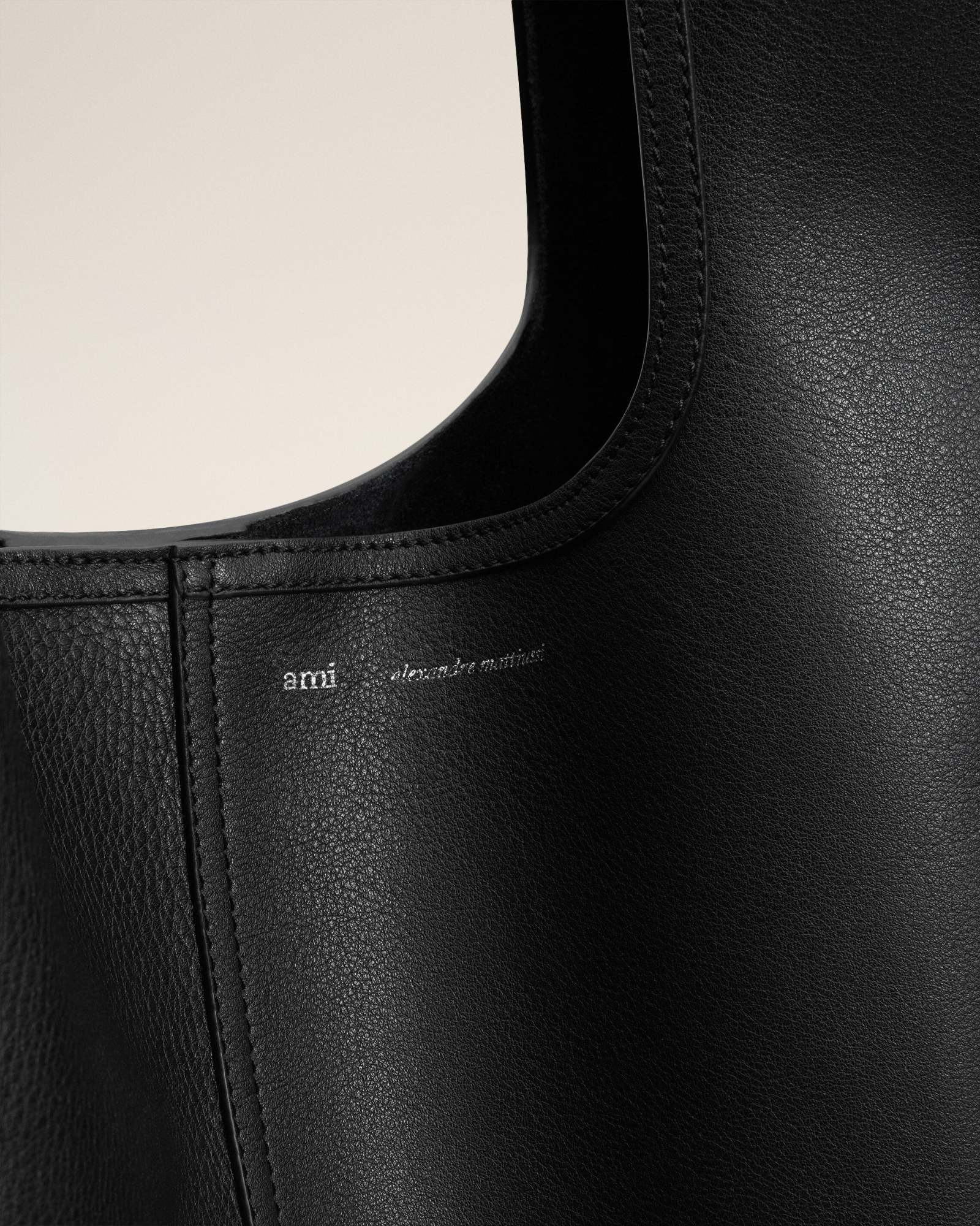 Ami Alexandre Mattiussi Etienne Hobo Bag In Supple Leather. In Black