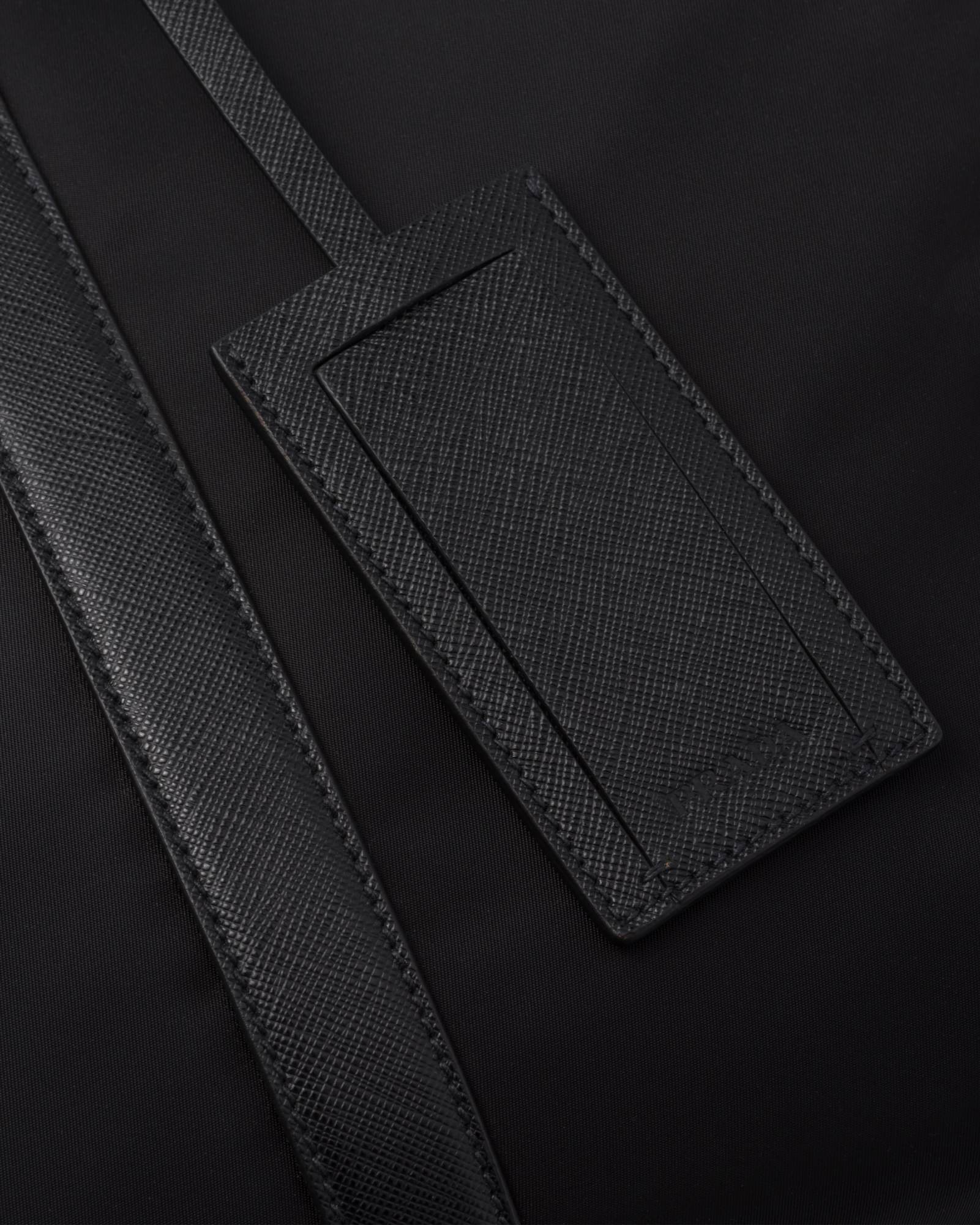 Prada Triangle-logo Zipped Tote Bag In Black