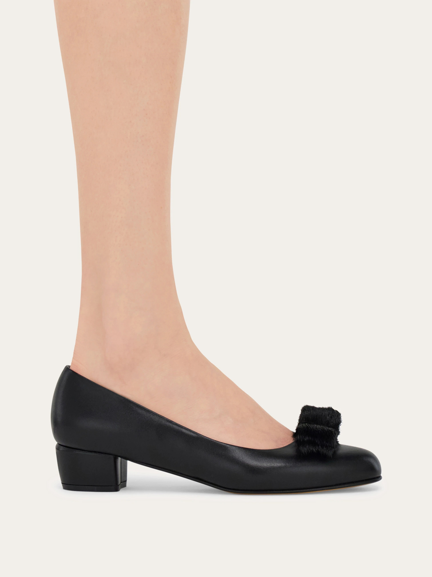 Ferragamo Vara Genuine Shearling Bow Pump In Black