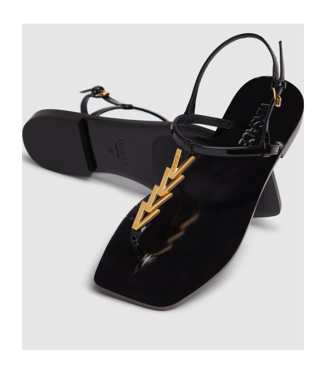 Shop Versace V-chain Leather Flip-flops Sandals