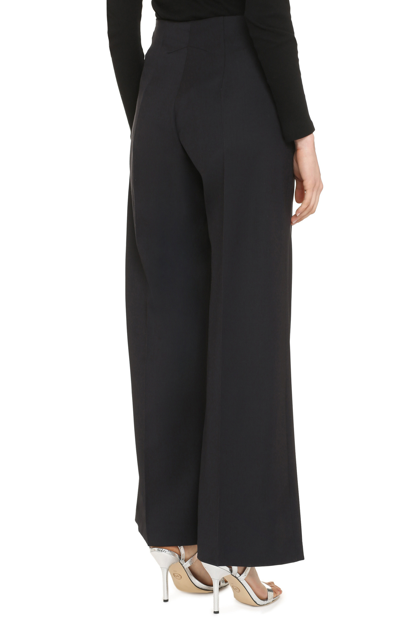 Patou Flared High-waisted Wool Blend Trousers In Black