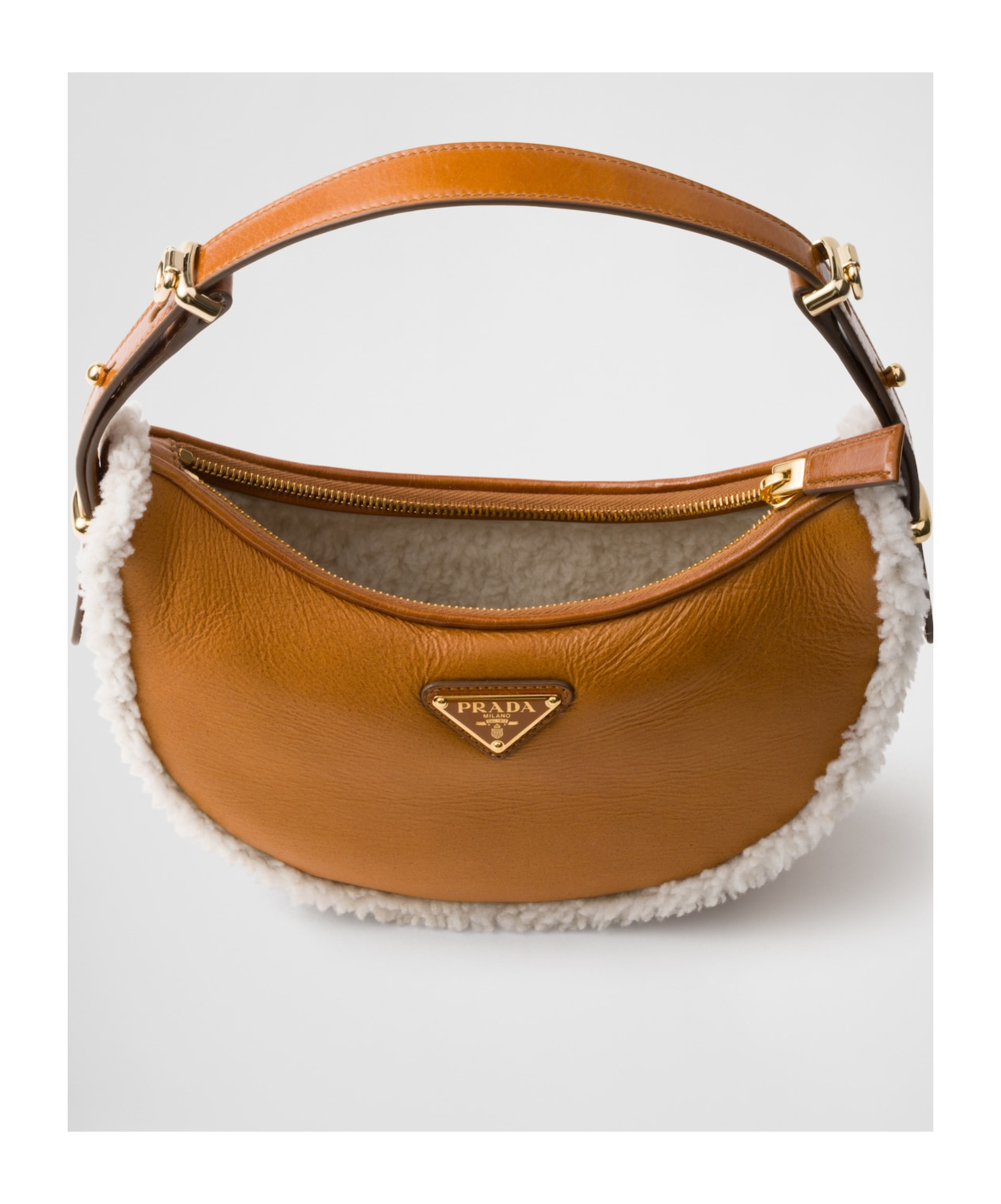 Prada Small Shearling Shoulder Bag In Brown