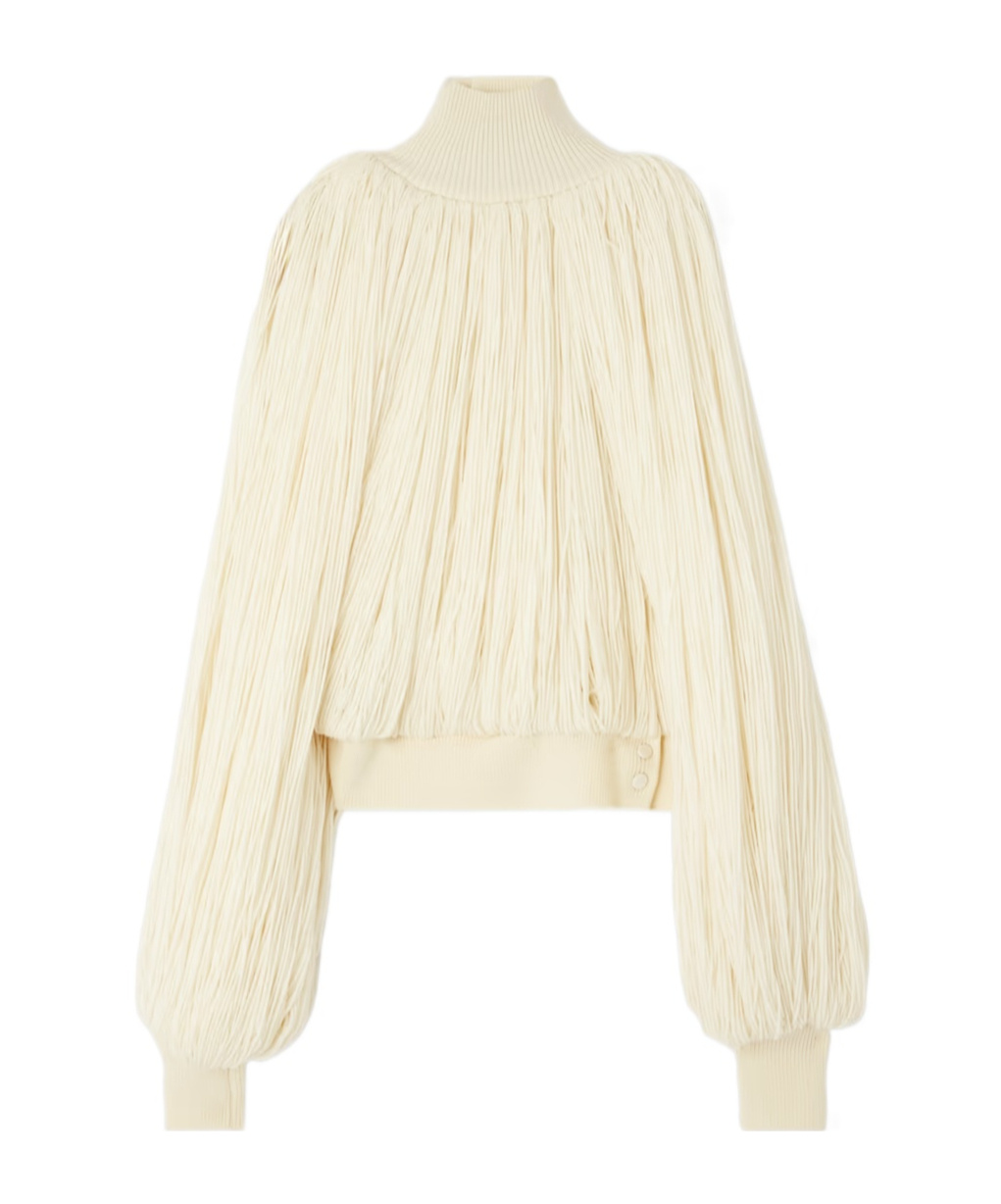 Shop Alaïa Tassel Wool Turtleneck In White