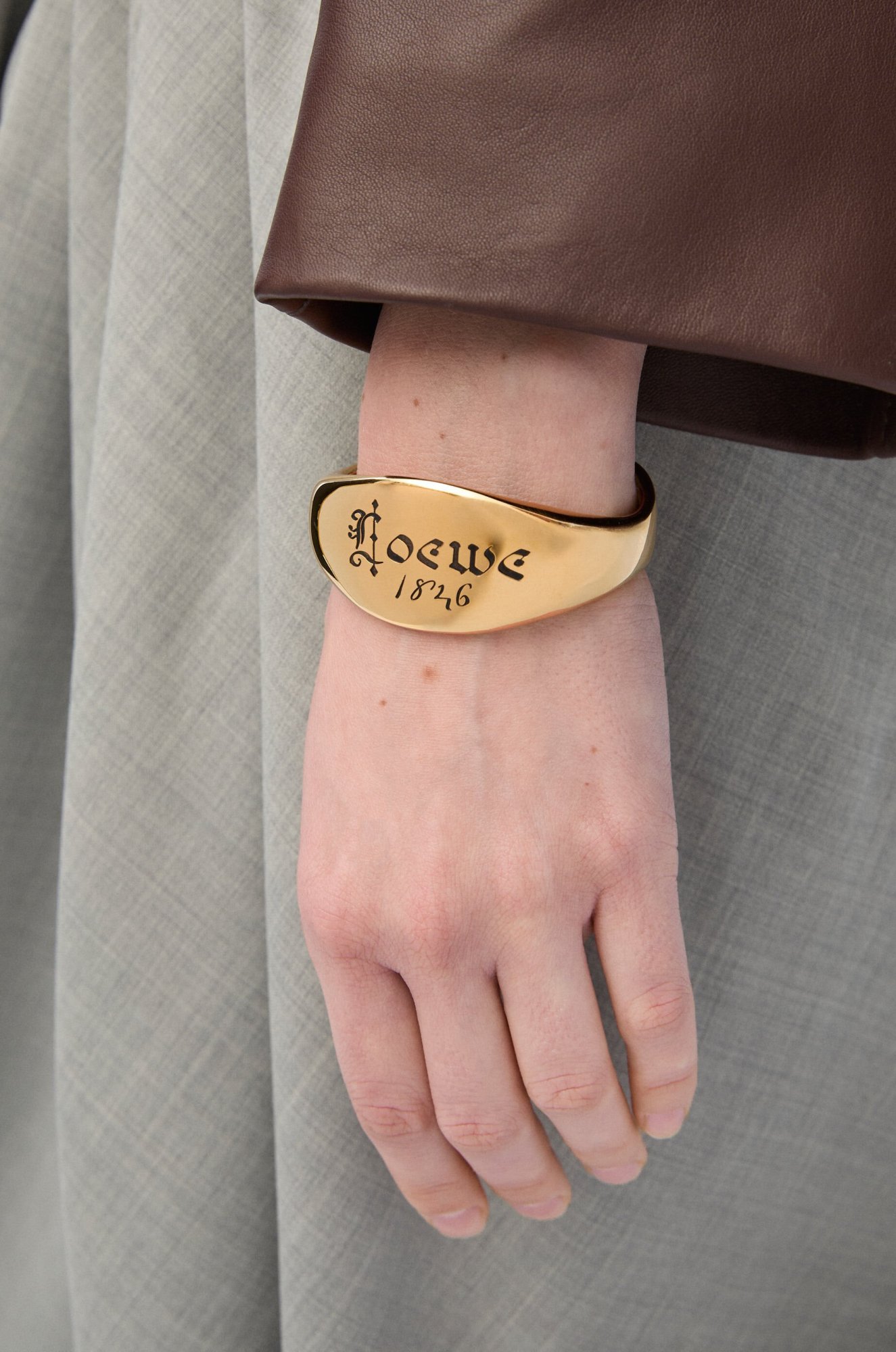 Loewe Seal Cuff Bracelet In Yellow