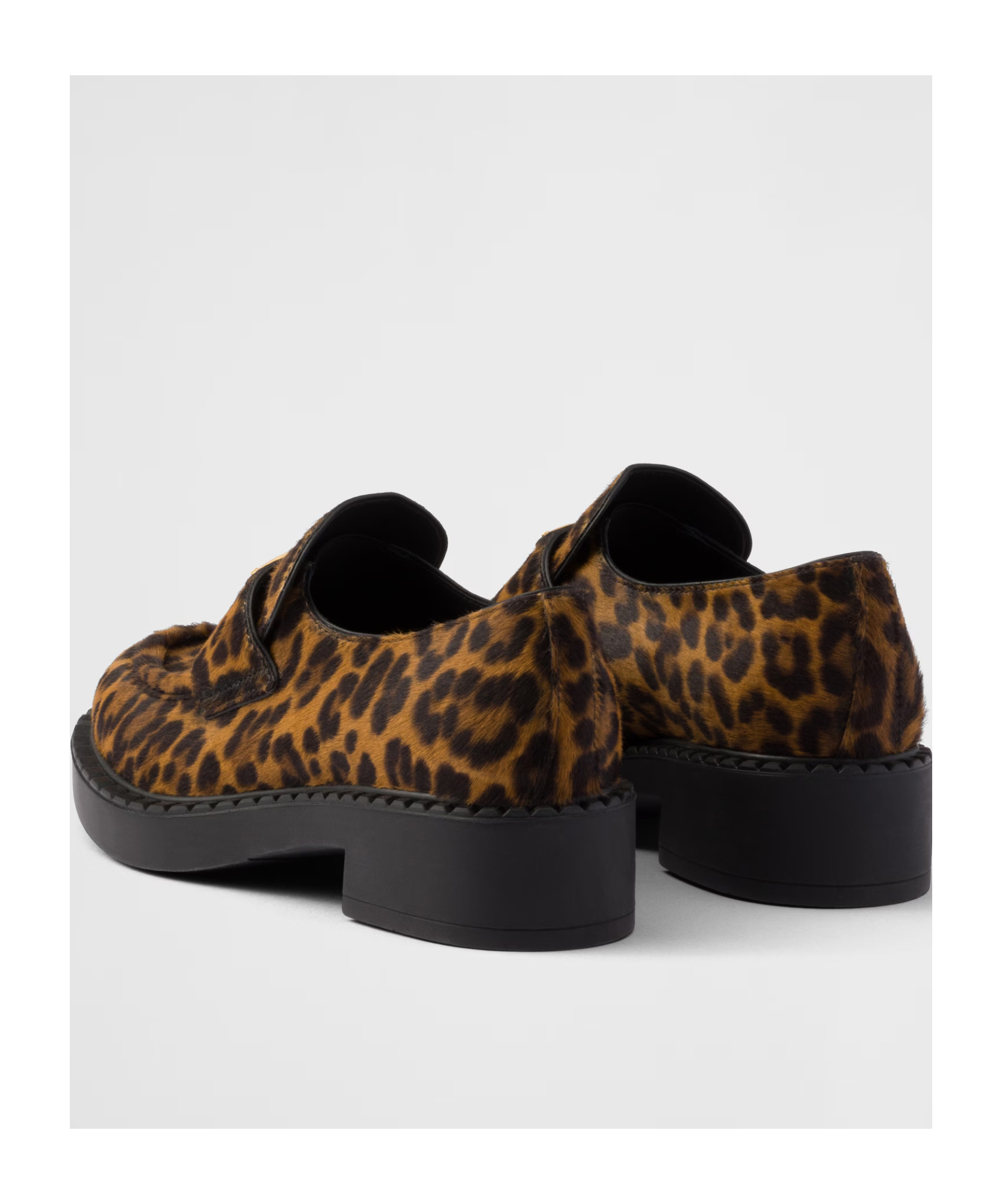 Prada Leopard Calf Hair Triangle Loafers In Black
